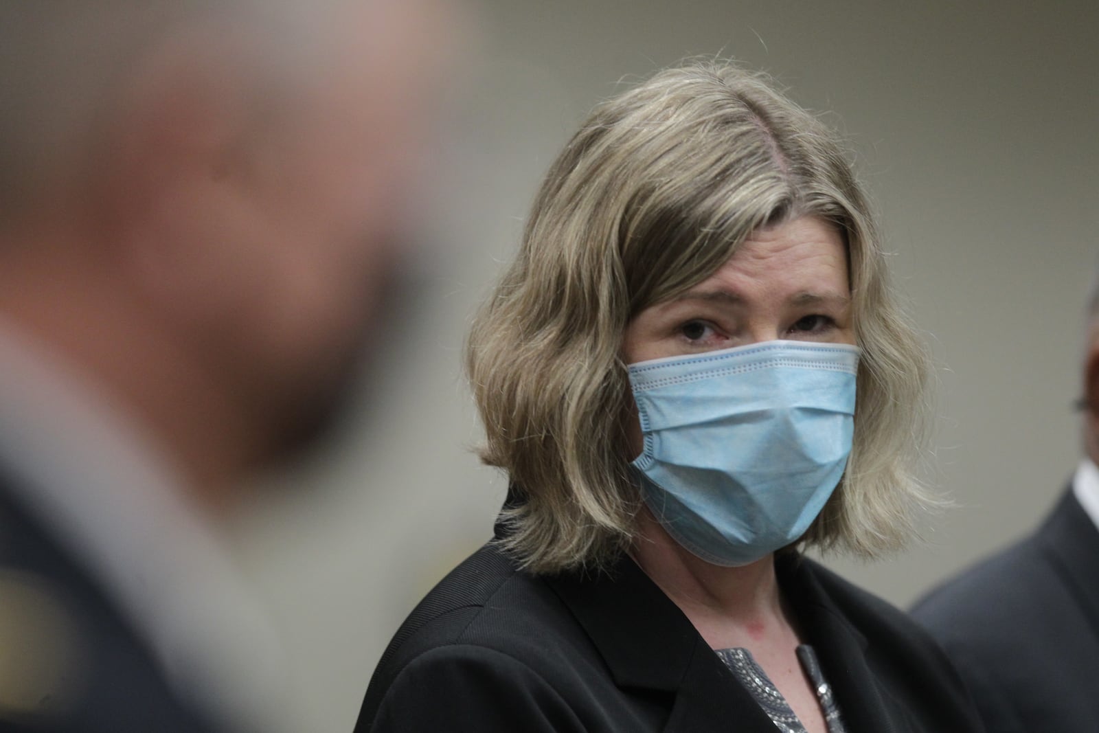 Dayton Mayor, Nan Whaley watches Police Chief Richard Biehl before he announces his retirement on Tuesday April 13, 2021. JIM NOELKER\STAFF