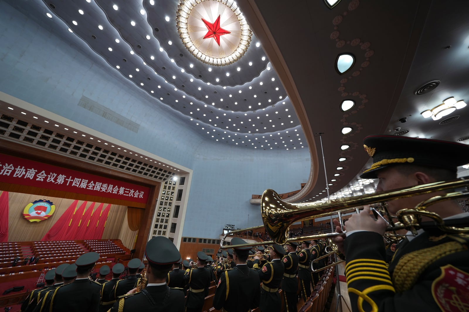 Chinese band members rehearse for the opening of the Chinese People's Political Consultative Conference held at the Great Hall of the People in Beijing, Tuesday, March 4, 2025. (AP Photo/Ng Han Guan)