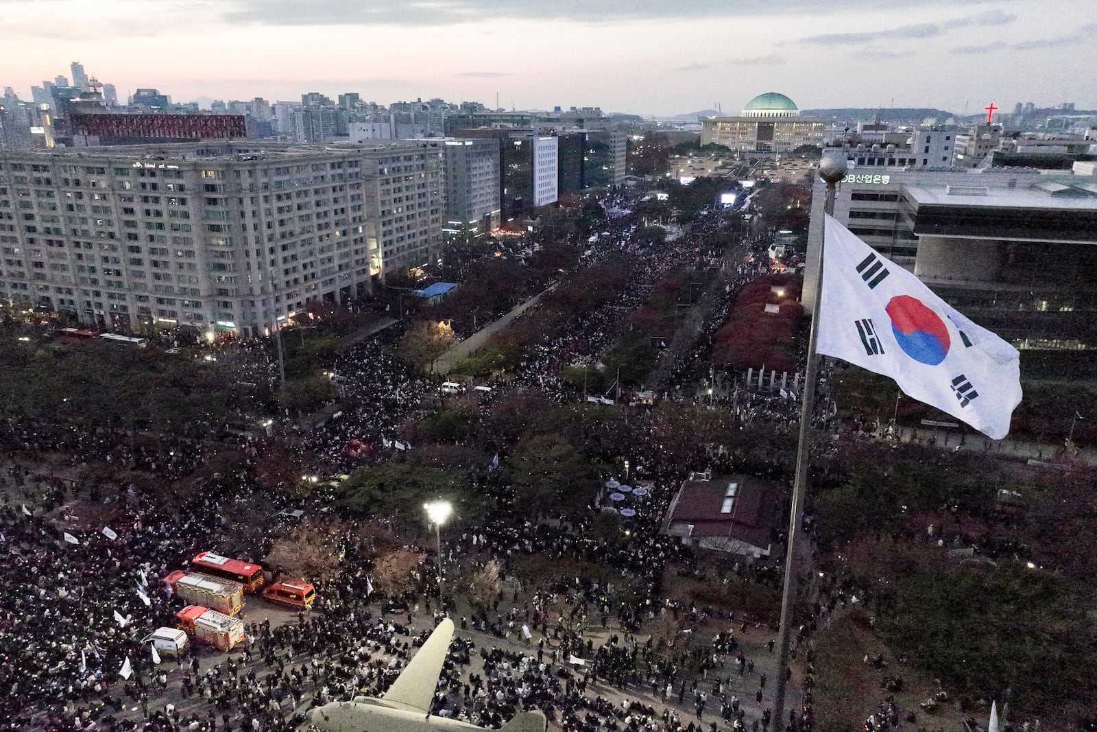 Protesters stage a rally demanding South Korean President Yoon Suk Yeol's impeachment following the president's short-lived martial law declaration in front of the National Assembly in Seoul, South Korea, Saturday, Dec. 7, 2024. (Seo Dae-yeon/Yonhap via AP)