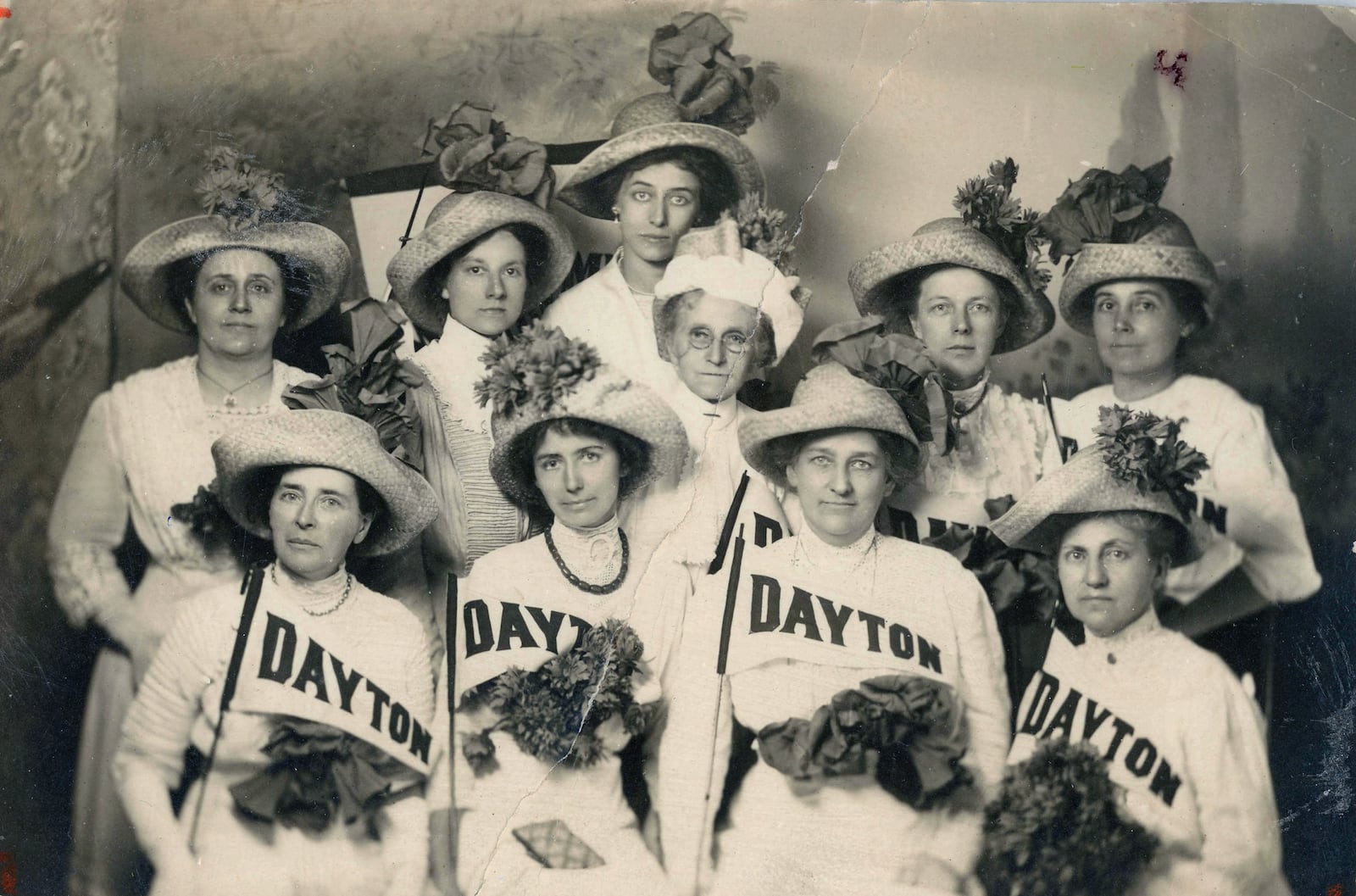 Jesse Leech Davisson (front row, third from left) was among the members of the Woman's Suffrage Association of Montgomery County who attended an August 27, 1912, parade in Columbus. Pictured in the back row from left are Ada Eby, Lena Bunn, Mrs. R.K. Welliver, Jane Morlay, A.K. Neibel and Elizabeth Hecker. From the left in front are Mrs. McCrea, Mrs. Kipple Hall, Davisson and Mrs. J.E. Welliver. DAYTON METRO LIBRARY WOMAN'S SUFFRAGE COLLECTION