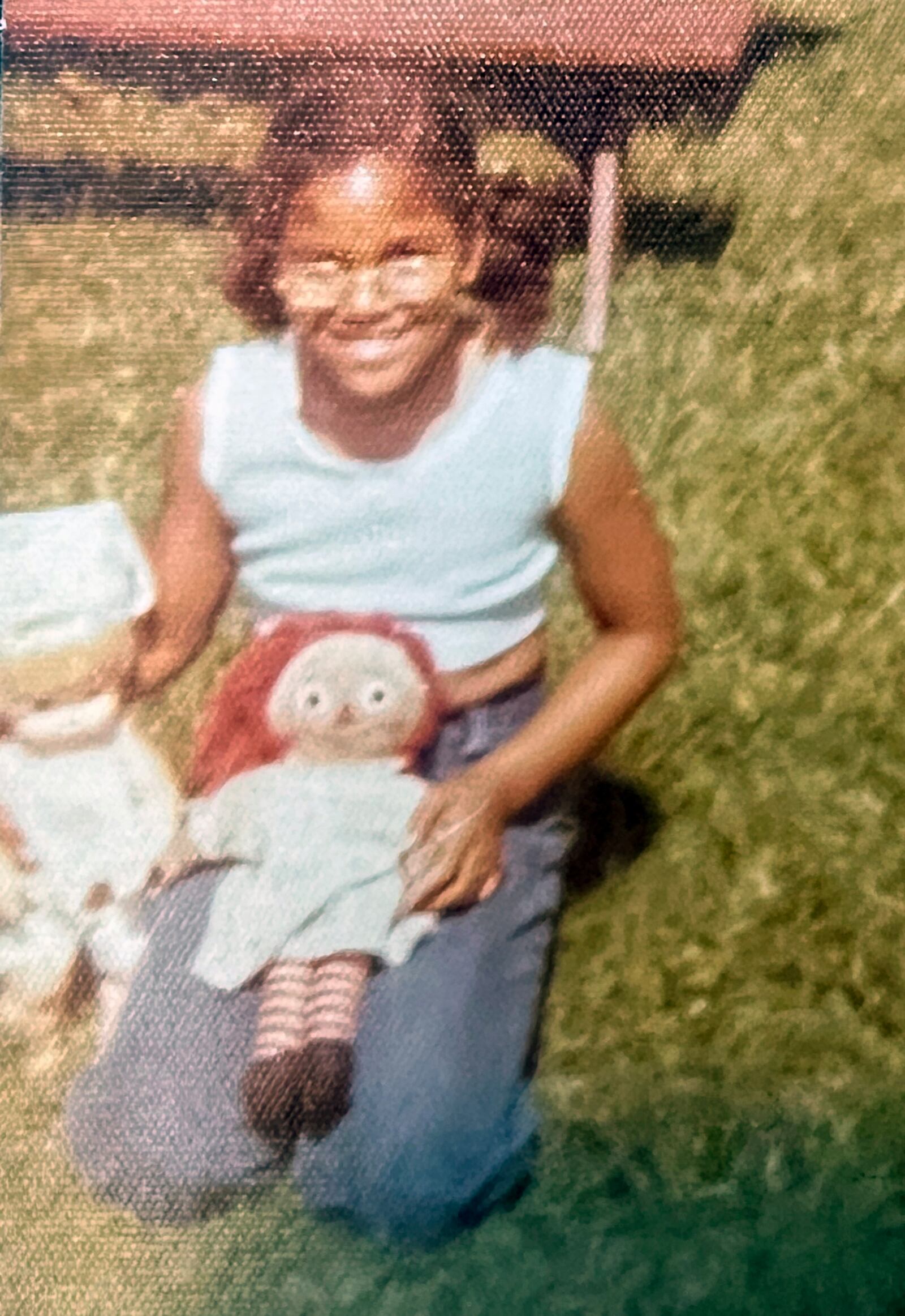 Angela Henry in Springfield at age 7. She was always an avid reader and writer.