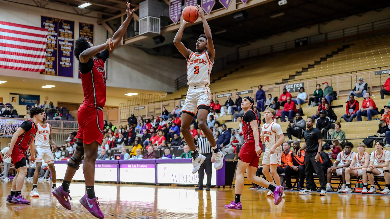 Beavercreek High School senior Kaden Ellerbe shoots over Princeton's X during their game on Saturday afternoon at the Vandalia Butler Student Activities Center. MICHAEL COOPER/STAFF