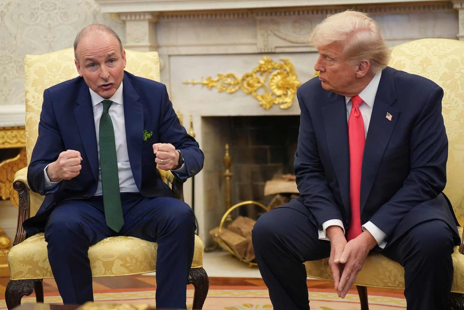 Taoiseach Micheal Martin, left, attends a bilateral meeting with President Donald Trump ahead of the White House St Patrick's Day reception, Wednesday March 12, 2025, in Washington. (Niall Carson/PA via AP)