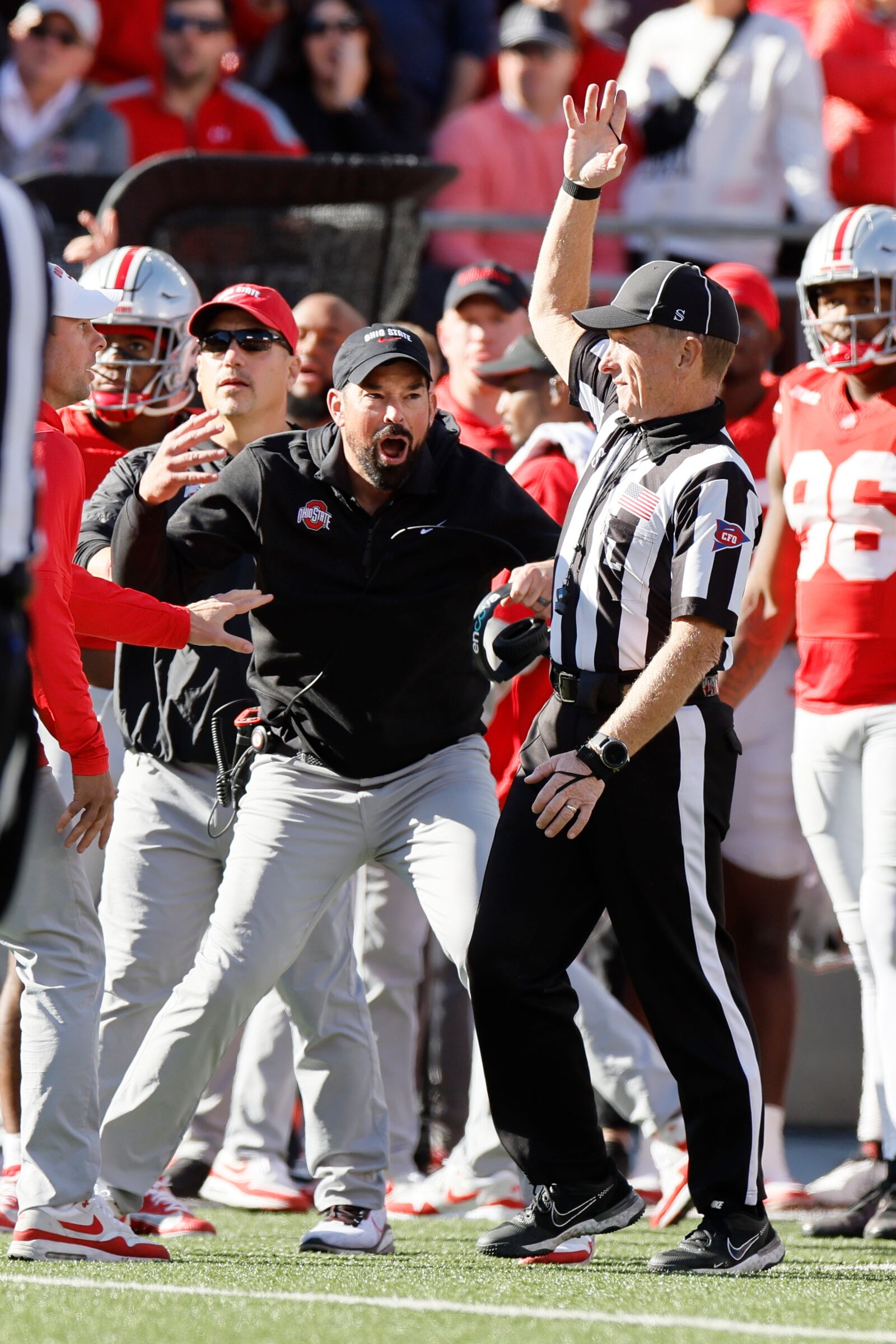 Ohio State head coach Ryan Day argues with a game official during the second half of an NCAA college football game against Nebraska Saturday, Oct. 26, 2024, in Columbus, Ohio. (AP Photo/Jay LaPrete)