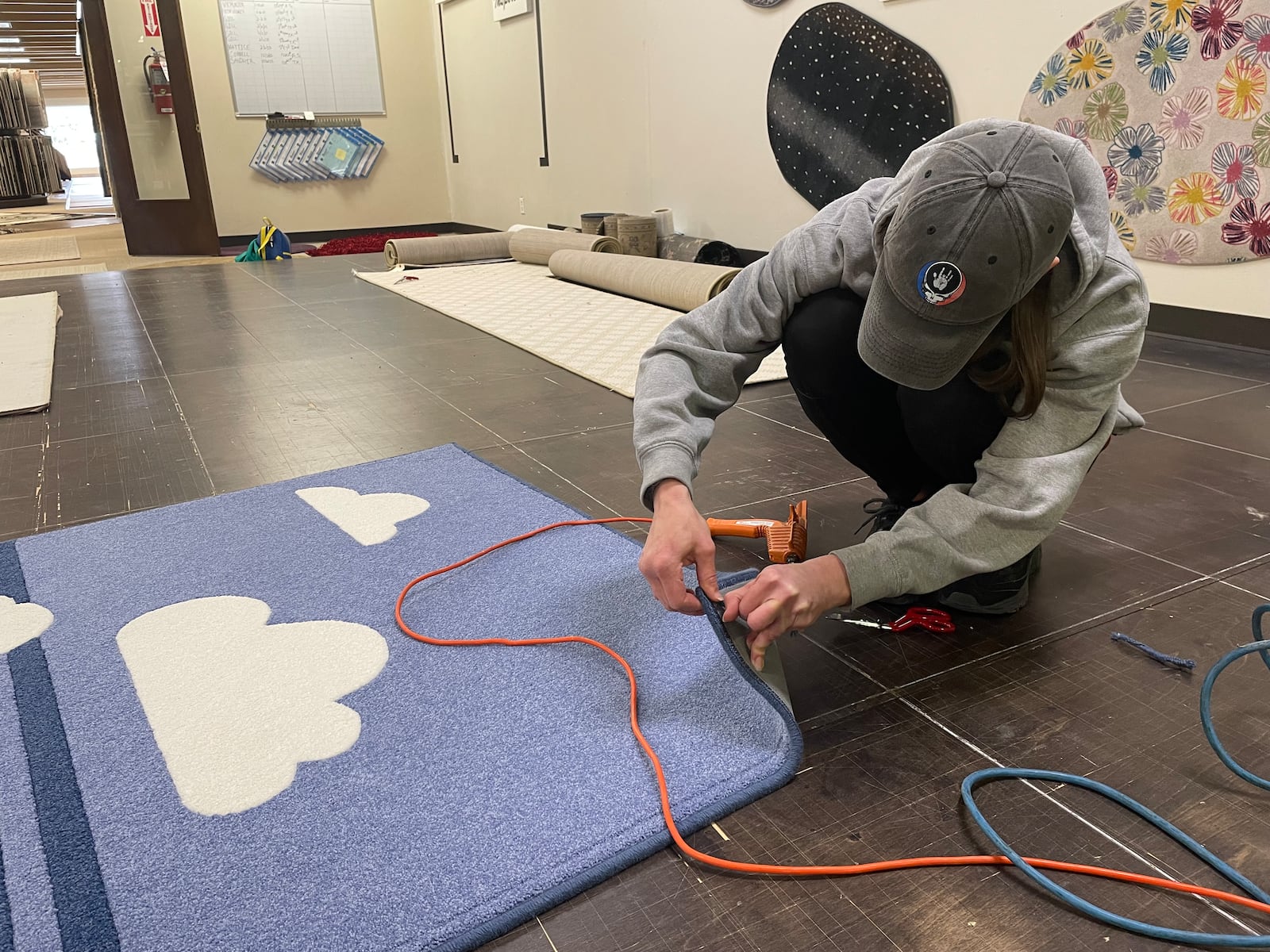 Bockrath Flooring and Rugs, a Dayton area business since 1959, has partnered with We Care Arts to bring an artist’s work on paper to life through a rug.