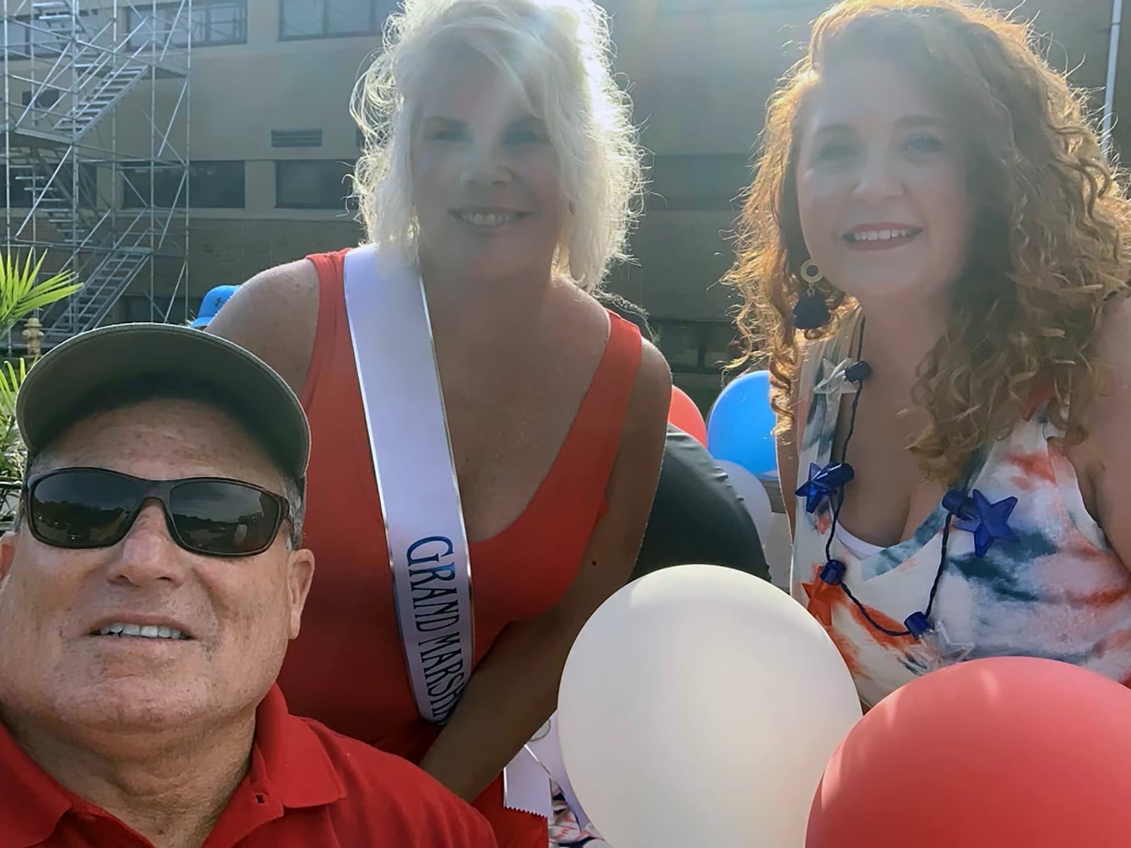 Rodgers in 2022 as the grand marshal of the Beavercreek 4th of July parade. L-R Rick Perales, Rodgers and Ashley Runk