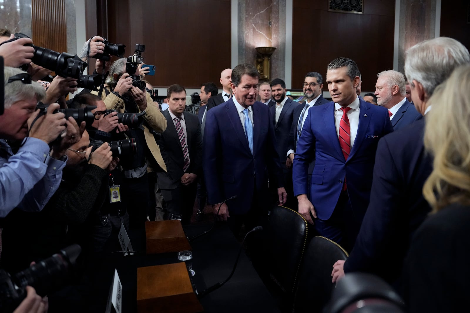 Pete Hegseth, President-elect Donald Trump's choice to be Defense secretary, arrives before the Senate Armed Services Committee for his confirmation hearing, at the Capitol in Washington, Tuesday, Jan. 14, 2025. (AP Photo/Ben Curtis)