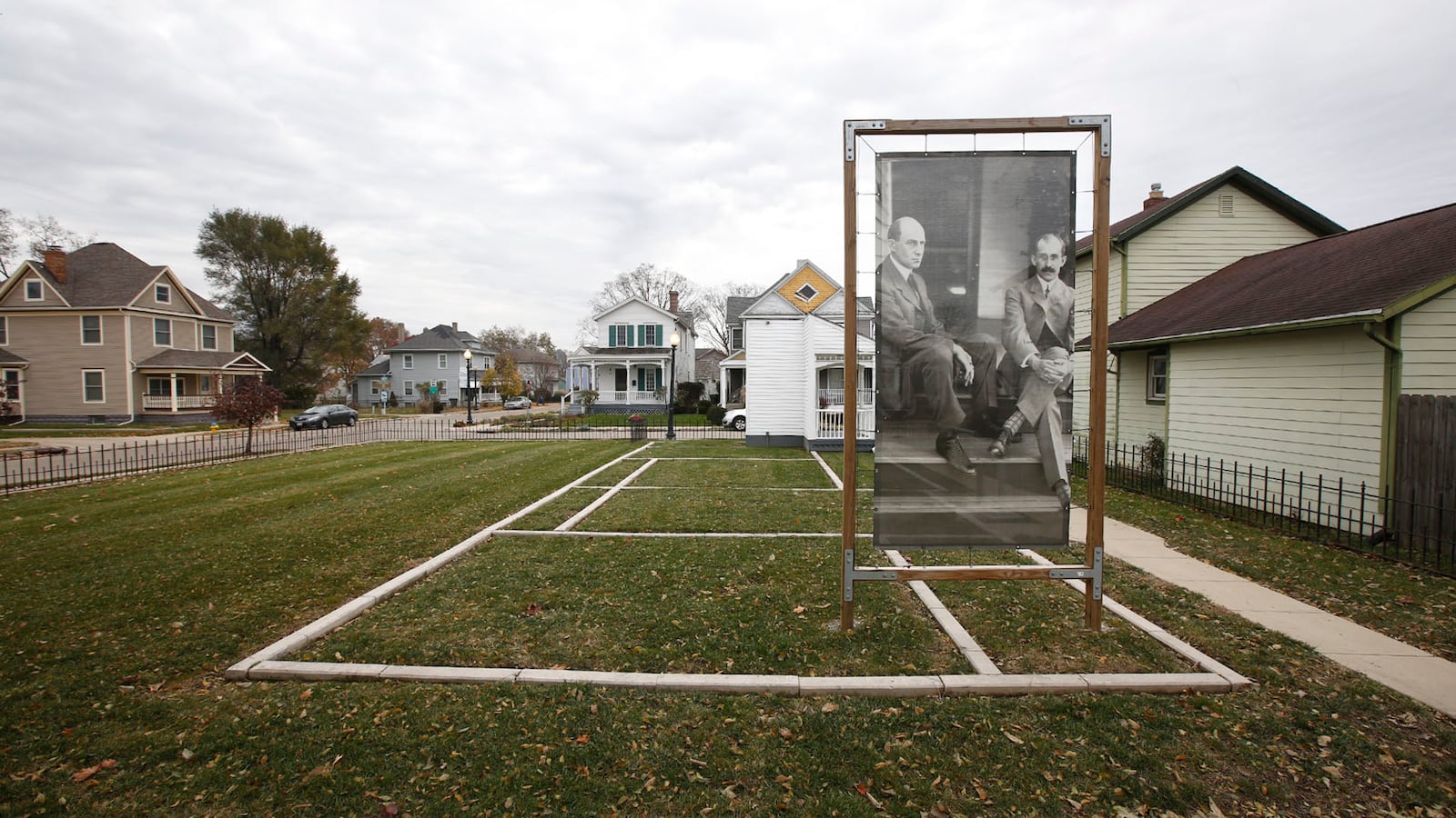 Seven Hawthorn Street in Dayton was the location of the Wright Family home at the turn of the century.  Photographer, author and aviation historian Dan Patterson has installed a large art photo print of the Wright Brothers on the site.  Henry Ford moved this house and the Wright's bicycle shop to Michigan in the 1930s.  TY GREENLEES / STAFF