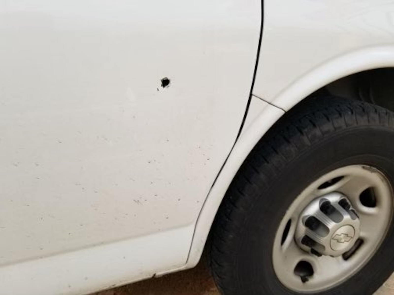 A bullet went through the front passenger door of a white 2014 Chevrolet Express van during an apparent road rage incident Friday, July 16, 2021, on southbound Interstate 71 in Warren County. The other vehicle involved was a white Scion xB with Kentucky license plates, which has not been located.