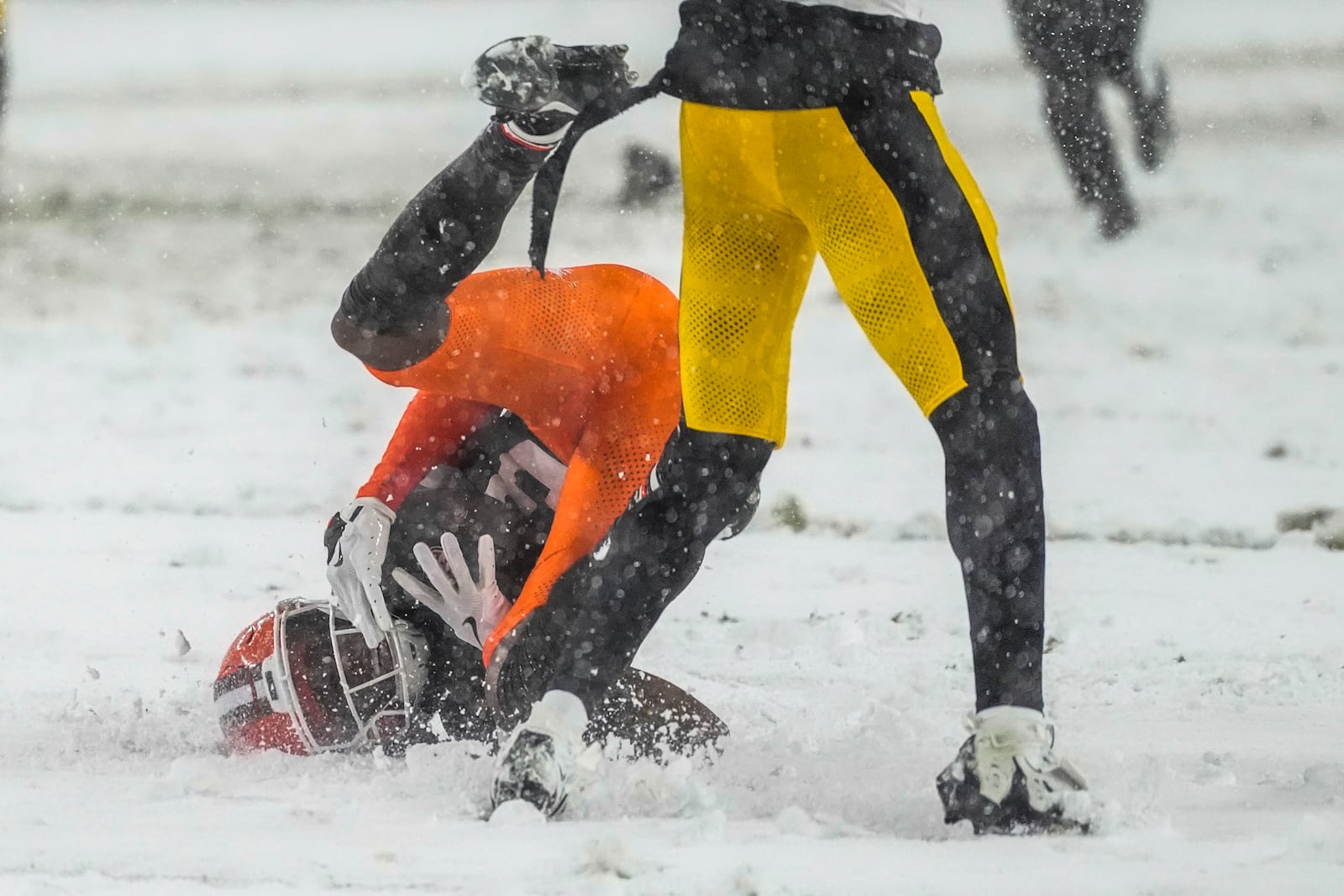 Cleveland Browns wide receiver Jerry Jeudy (3) pulls in a pass against Pittsburgh Steelers cornerback Joey Porter Jr. in the second half of an NFL football game, Thursday, Nov. 21, 2024, in Cleveland. (AP Photo/Sue Ogrocki)