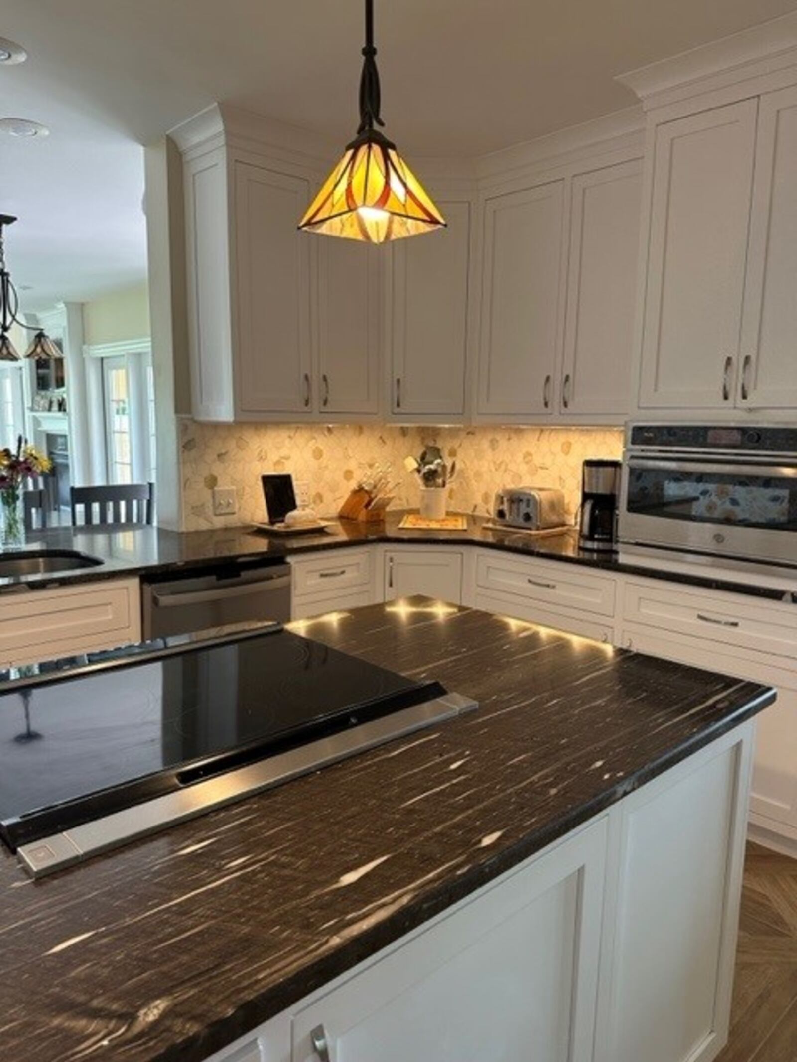 Leslie Josephson says her husband Dave tiled the backsplash and also chose the quartzite counters. 