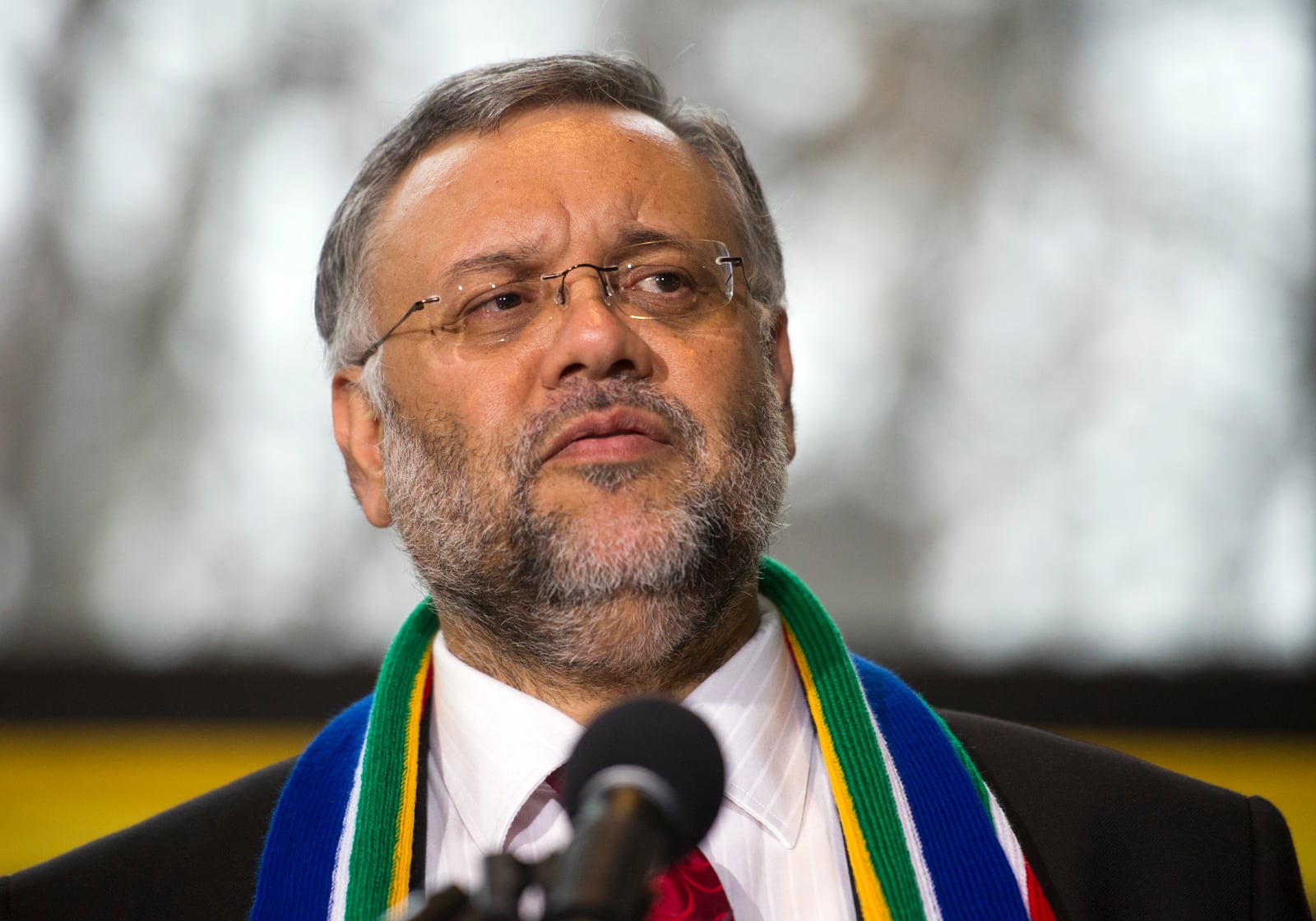 FILE - South Africa's ambassador to the U.S. Ebrahim Rasool speaks at the South African Embassy in Washington, Dec. 6, 2013. (AP Photo/Cliff Owen, File)