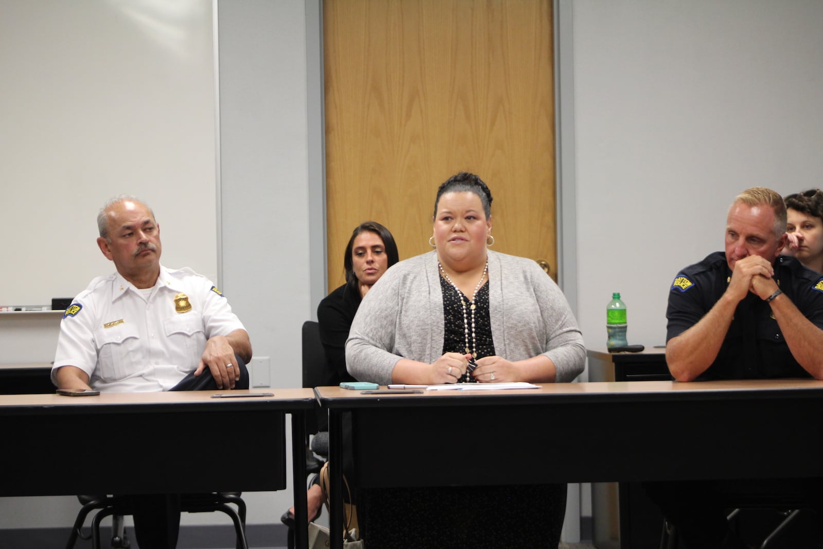 Dayton police Chief Kamran Afzal, Dayton Law Director Barbara Doscek and police Major Brian Johns at a recent Use of Force Committee meeting. CORNELIUS FROLIK / STAFF