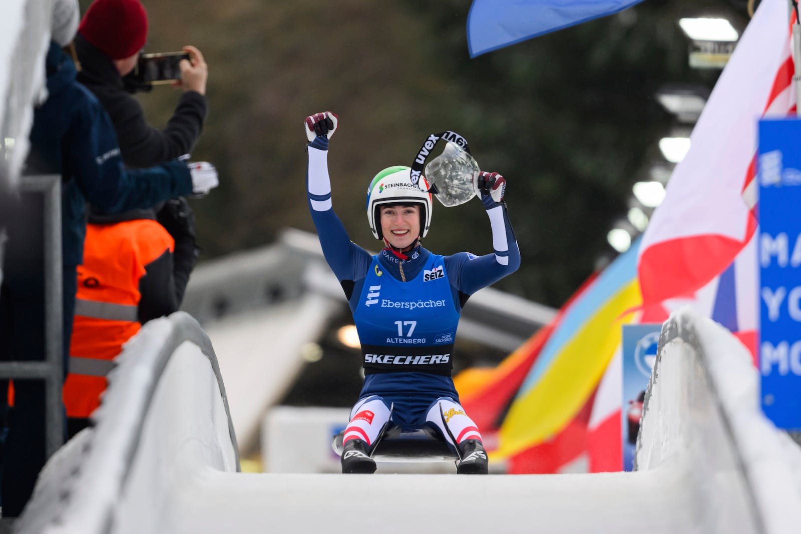 Madeleine Egle from Austria wins after the women's single-seater 2nd run at the Luge World Cup in Altenberg, Germany, Sunday Jan. 12, 2025. (Robert Michael/dpa via AP)