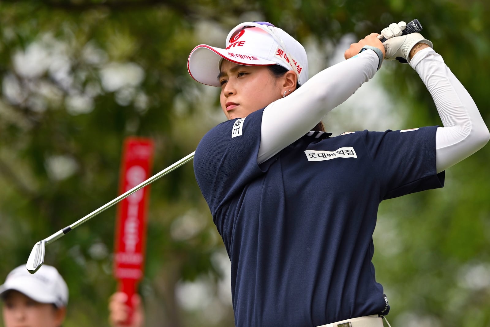 Hye-Jin Choi of South Korea watches her shot on the 16th hole during the first round of the LPGA Honda Thailand golf tournament in Pattaya, southern Thailand, Thursday, Feb. 20, 2025. (AP Photo/Kittinun Rodsupan)