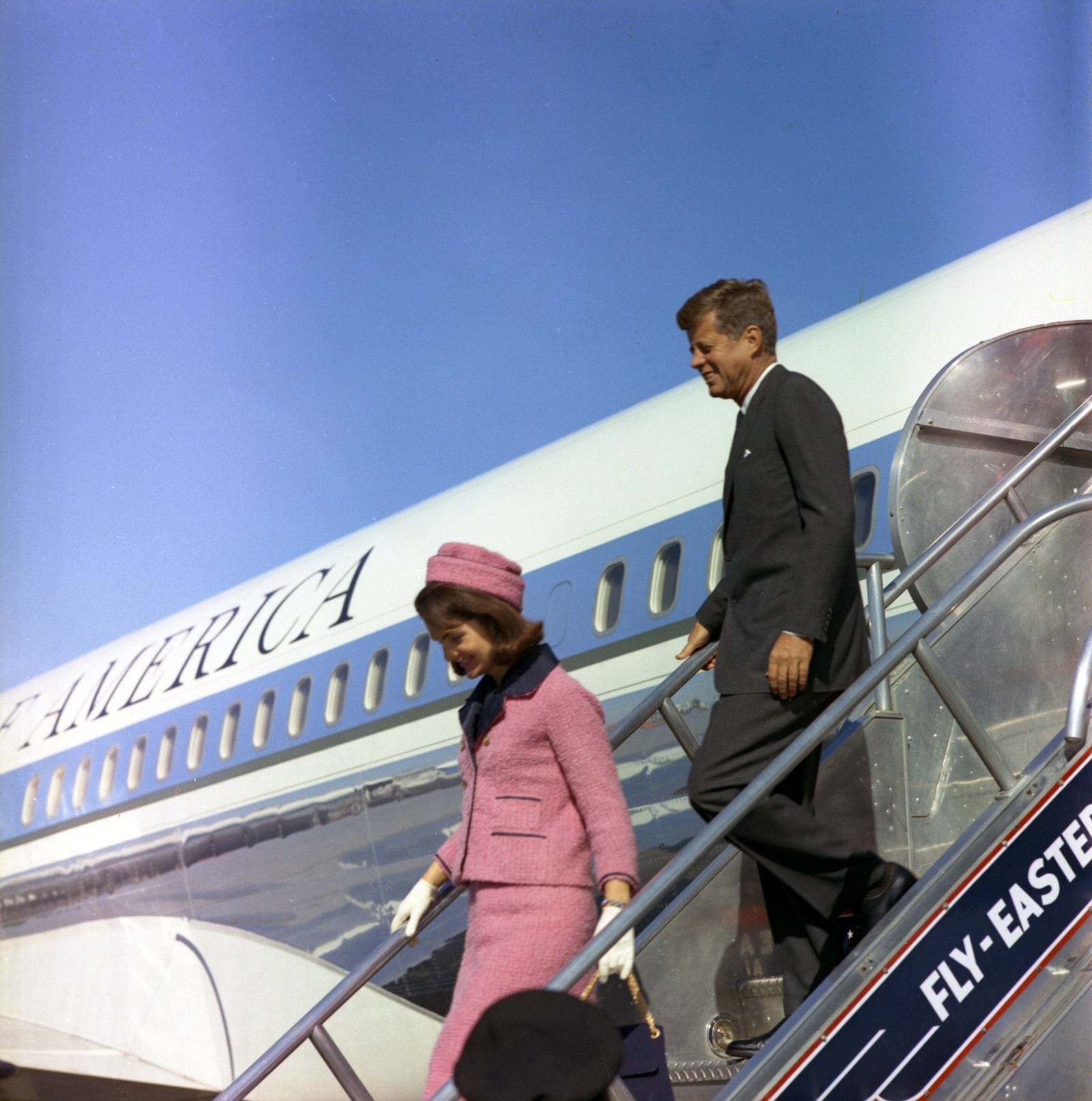 File photo dated November 22, 1963 courtesy the John F. Kennedy Presidential Library and Museum, Boston, shows President John F. Kennedy and First Lady Jacqueline Kennedy descending the stairs from Air Force One at Love Field in Dallas, Texas.