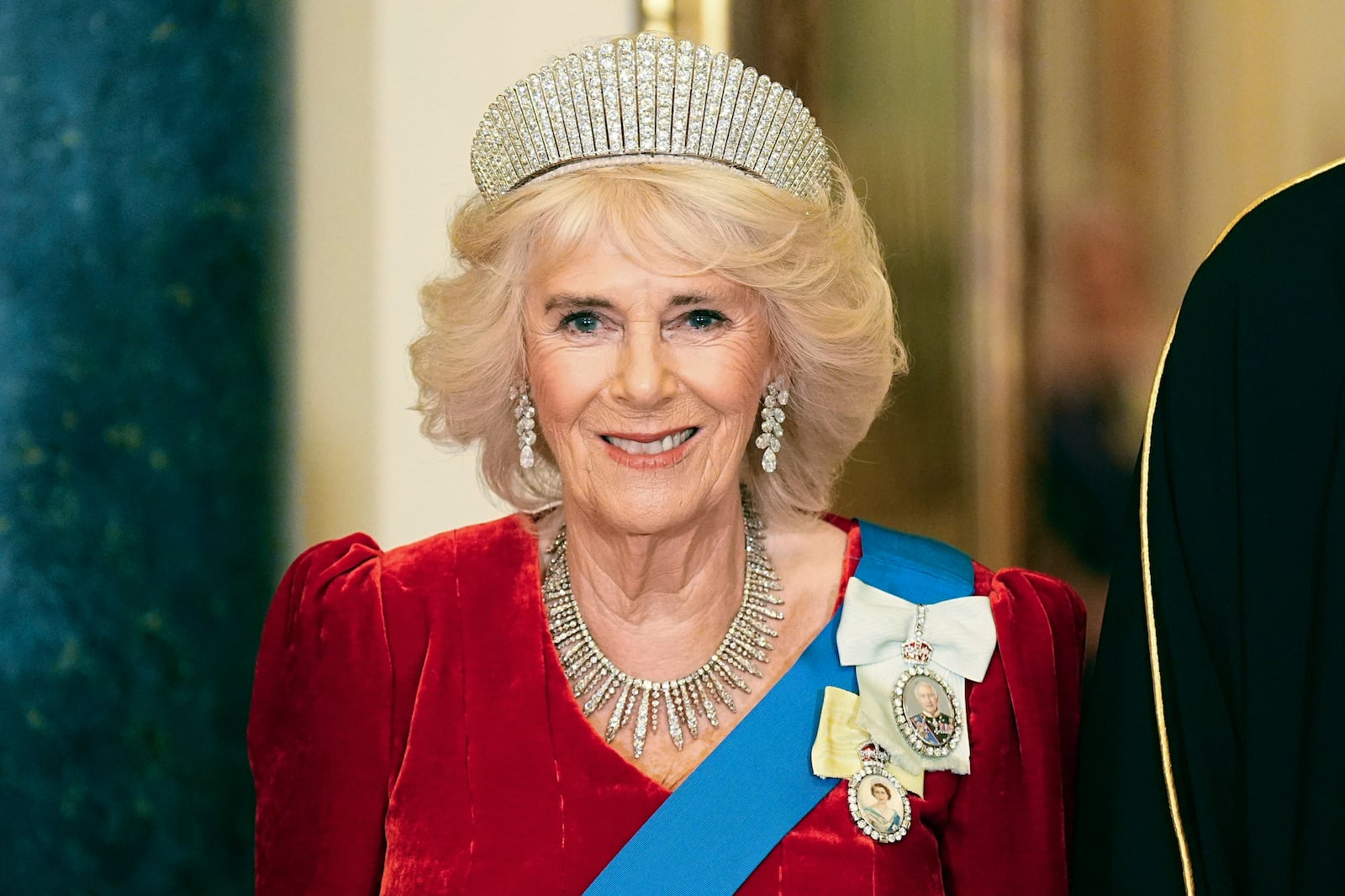 Britain's Queen Camilla ahead of a state banquet at Buckingham Palace, in London, Tuesday, Dec. 3, 2024, during the Emir of Qatar's state visit to the U.K. (Aaron Chown/Pool Photo via AP)