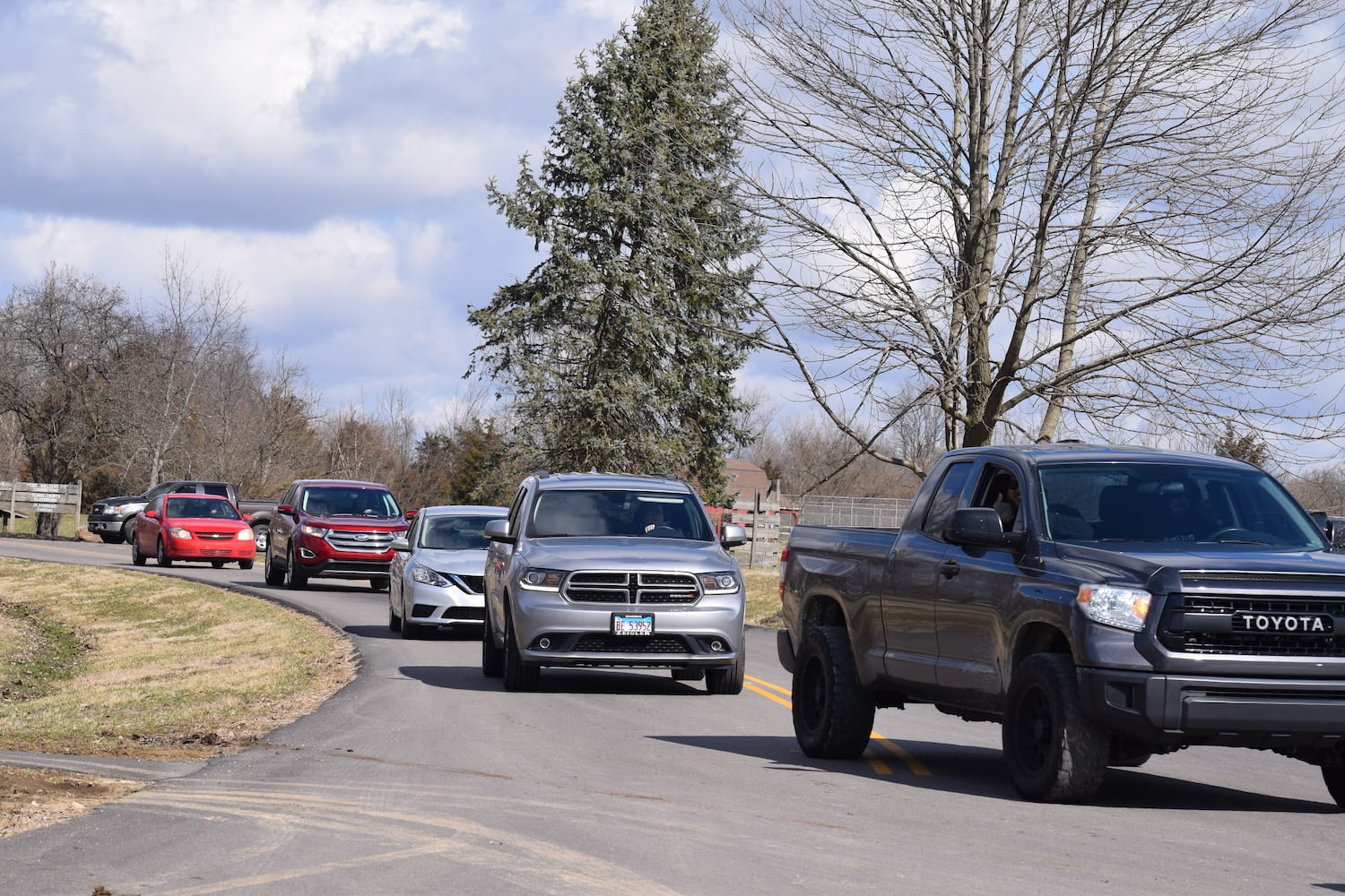 PHOTOS: Thousands of Outlaws attend motorcycle gang leaders funeral at Montgomery County Fairgrounds.