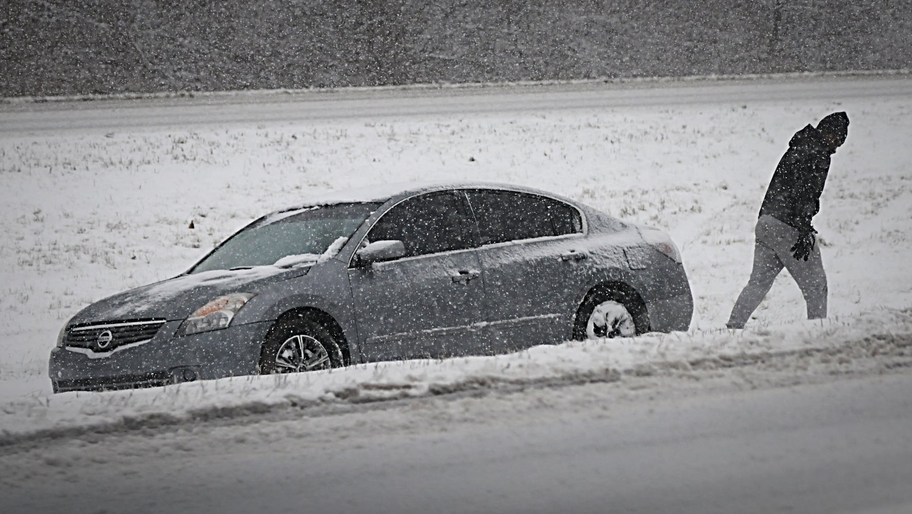 PHOTOS: Snowstorm covers region Saturday