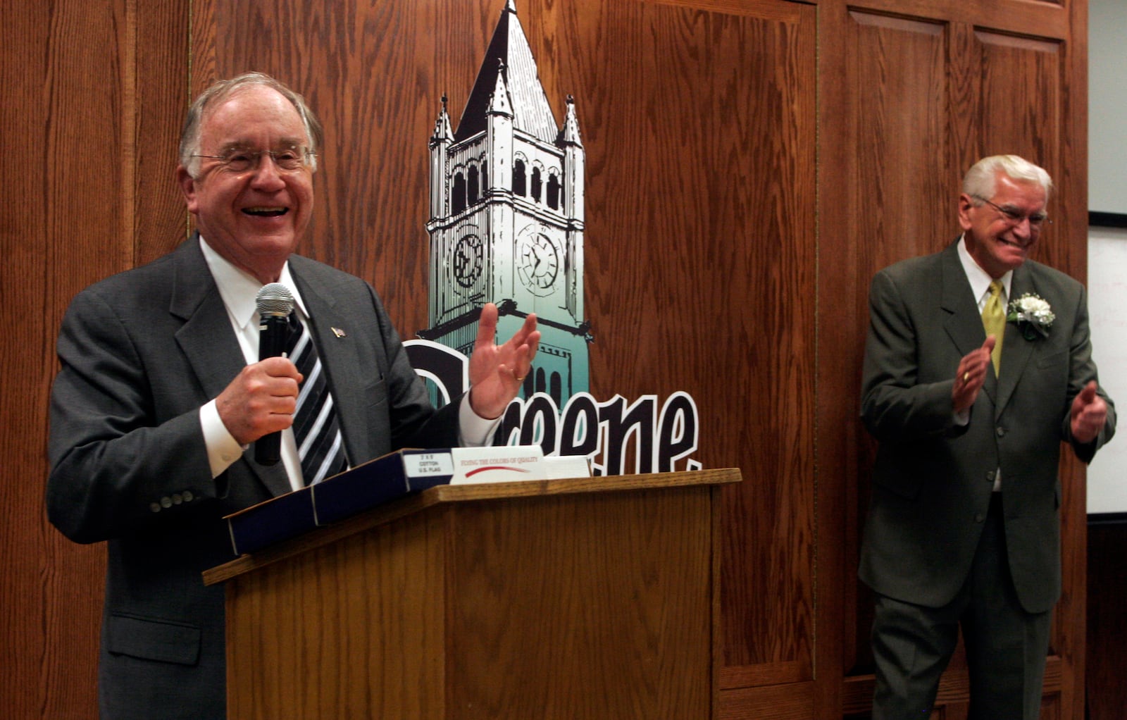 Retiring Congressman Dave Hobson draws a laugh from retiring Greene County Commissioner Ralph  Harper at Harper's retirement party.