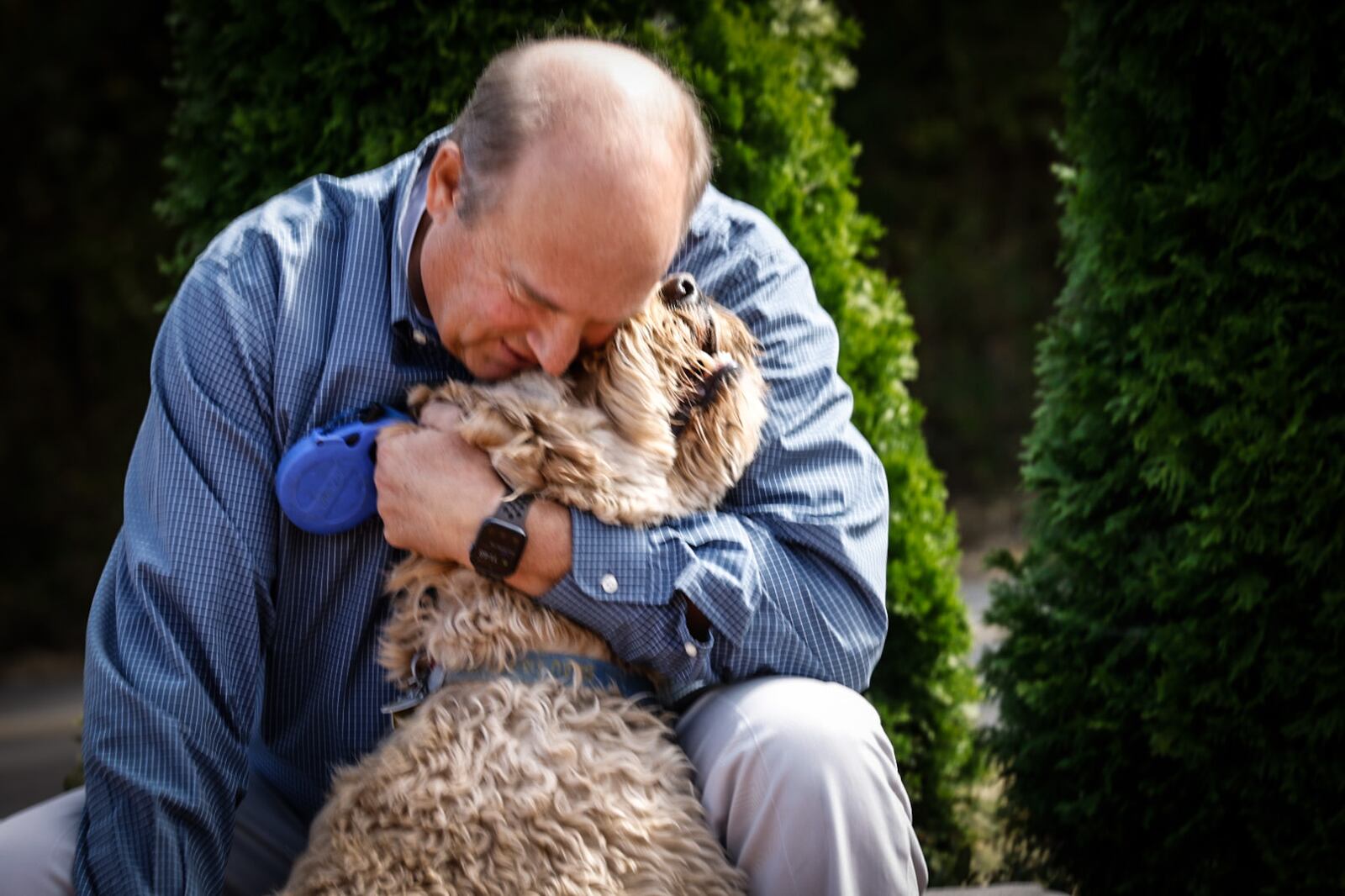 Community Gem Brian Weltge and is dog Bo. Weltge is the president and chief executive officer of the Humane Society of Greater Dayton. JIM NOELKER/STAFF