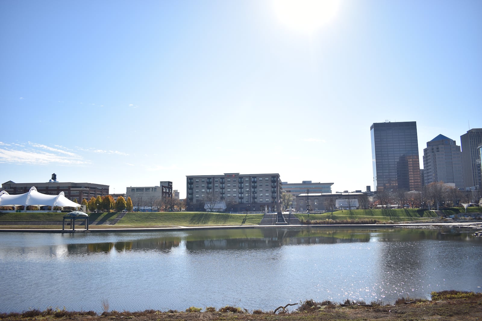 Downtown Dayton has welcomed 34 new businesses and 192 housing units. A new apartment building called The Monument opened across from RiverScape MetroPark, near the riverfront. CORNELIUS FROLIK / STAFF