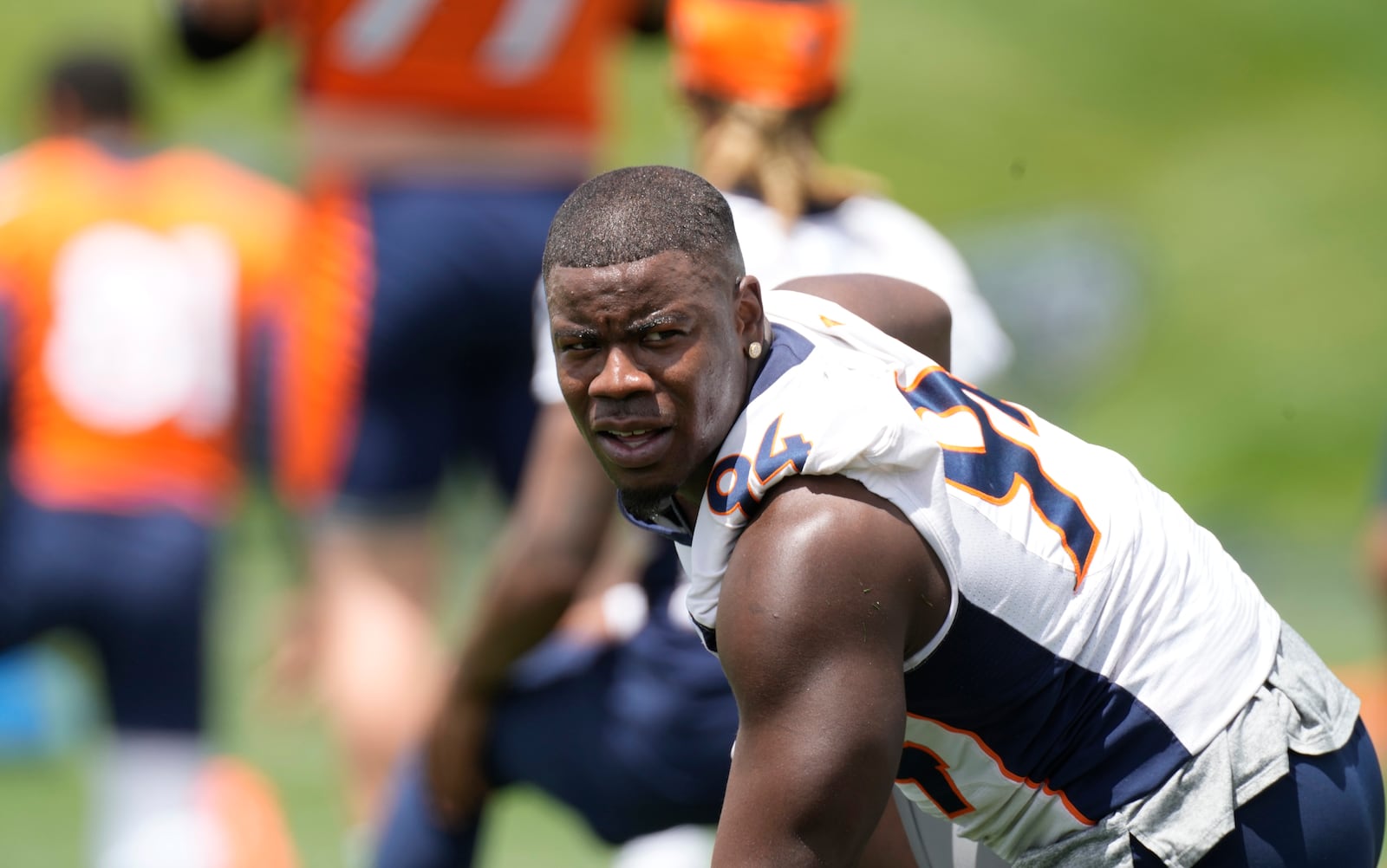 Denver Broncos outside linebacker Aaron Patrick takes part in drills at the NFL football team's headquarters Monday, June 6, 2022, in Centennial, Colo. (AP Photo/David Zalubowski)