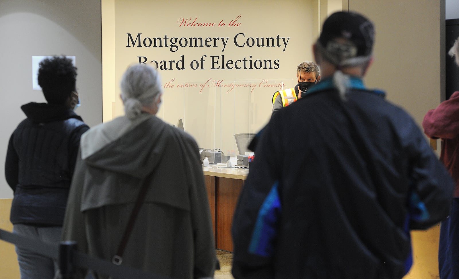 Voters waited in long lines Tuesday to vote early at the Montgomery County Board of Election. MARSHALL GORBY\STAFF