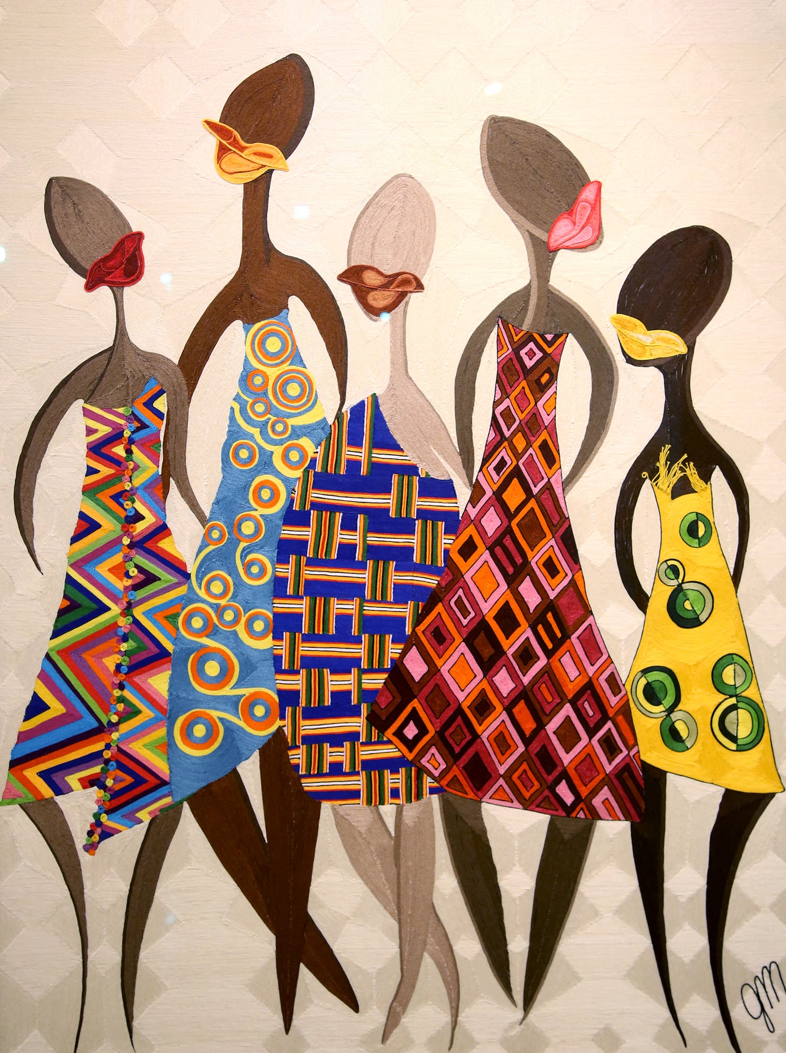 With intricate embroidery artist Gail Patrice Mallory of Houston, TX, has created five faceless women in colorful Kente cloth dresses for Women in Our Village. The 2020 Art of Soul! Exhibition in on view at the National Afro-American Museum and Cultural Center through Feb. 27, 2021. LISA POWELL / STAFF