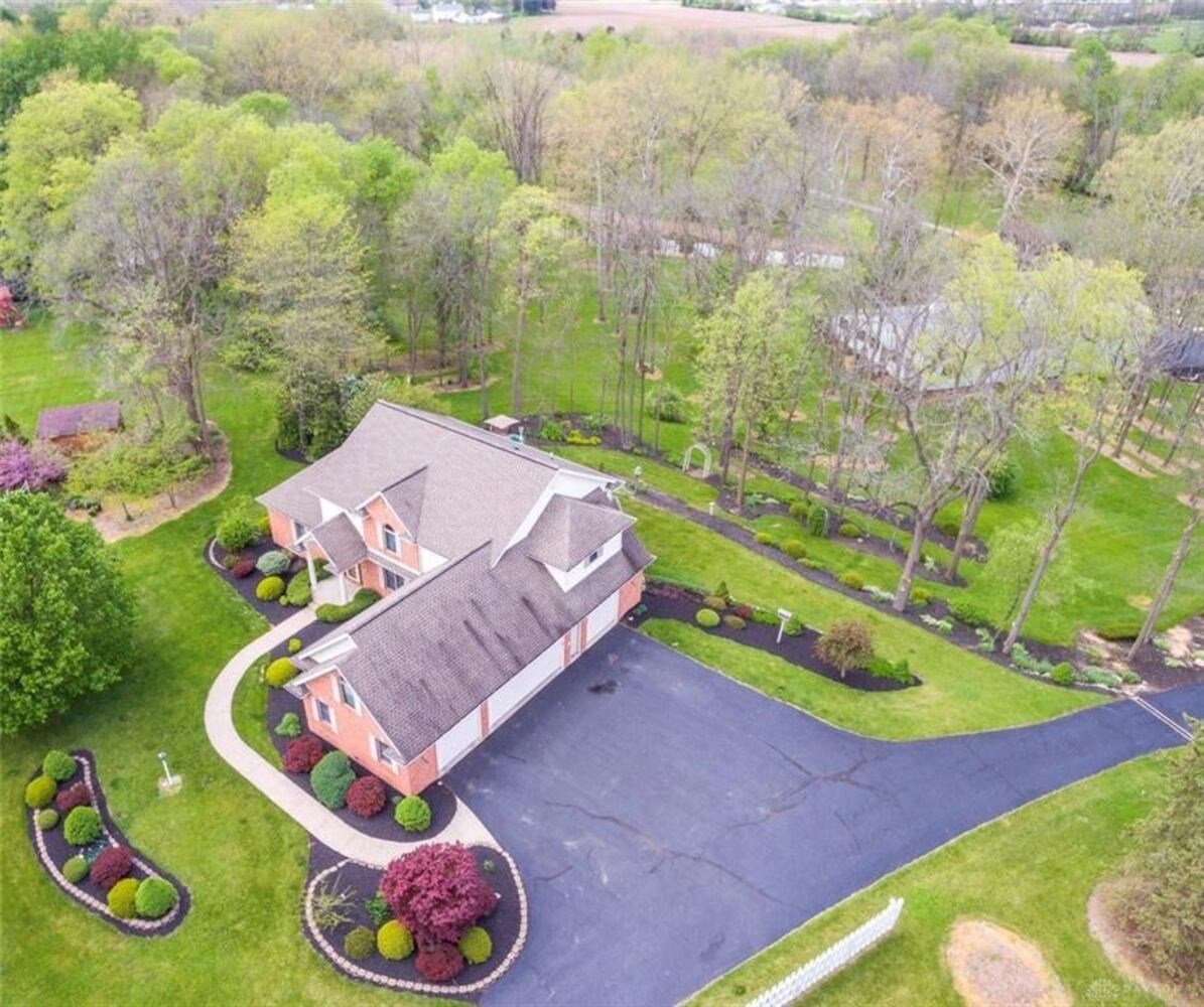 PHOTOS: Nearly 10-acre Miami County property listed has luxury home, stocked fishing pond