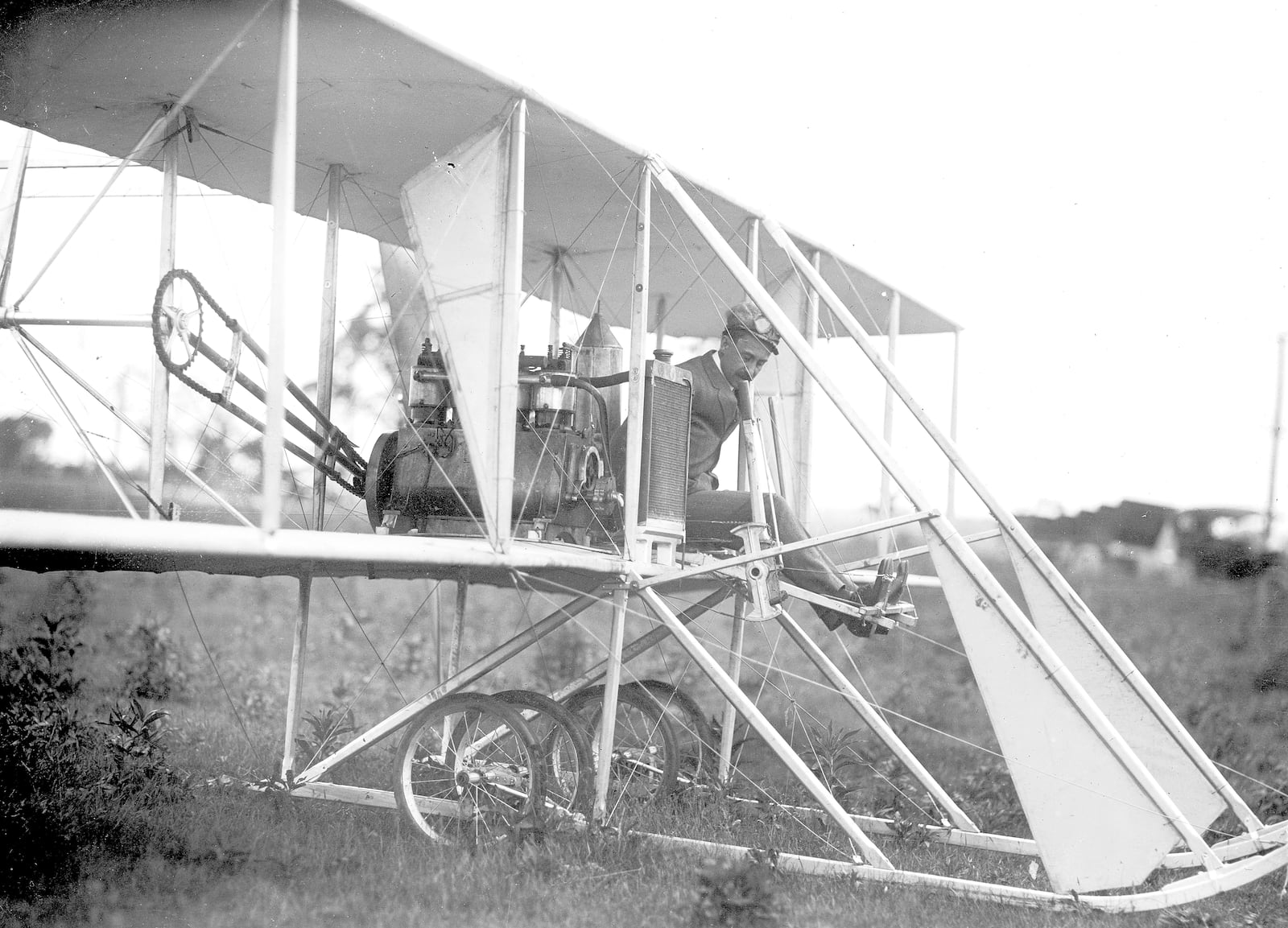 Orville Wright is at the controls of the Wright Model B in 1910 at Huffman Prairie.Photo by William Mayfield from the Marvin Christian Collection