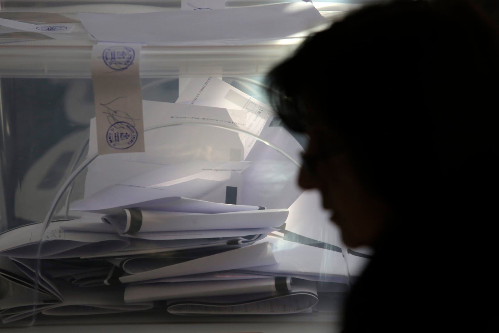 Ballots seen in a box at a polling station during the general elections in Sofia, Sunday, Oct. 27, 2024. (AP Photo/Valentina Petrova)