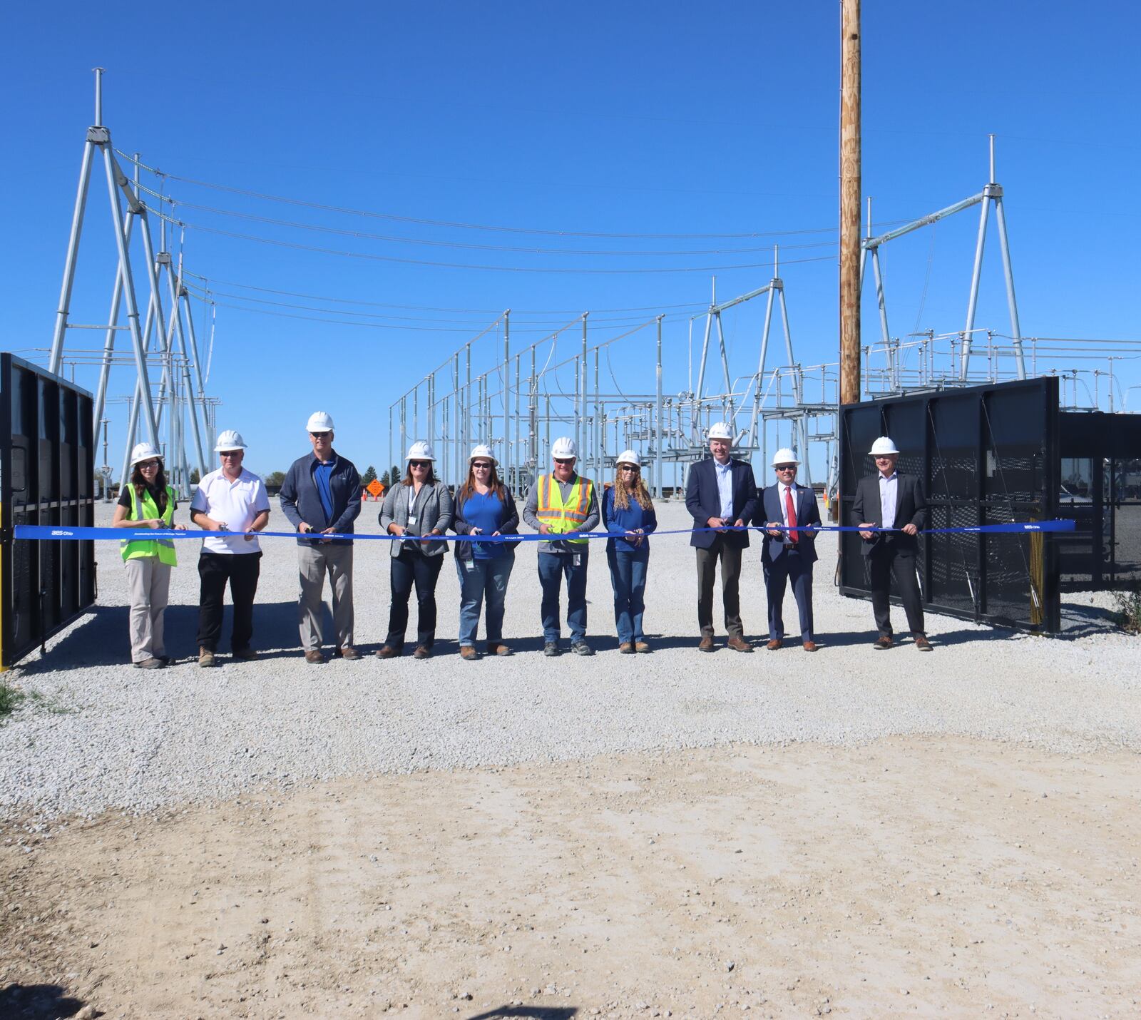 Preparing to cut the ribbon at the new  AES Ohio Fayette substation in Jeffersonville. AES Ohio photo