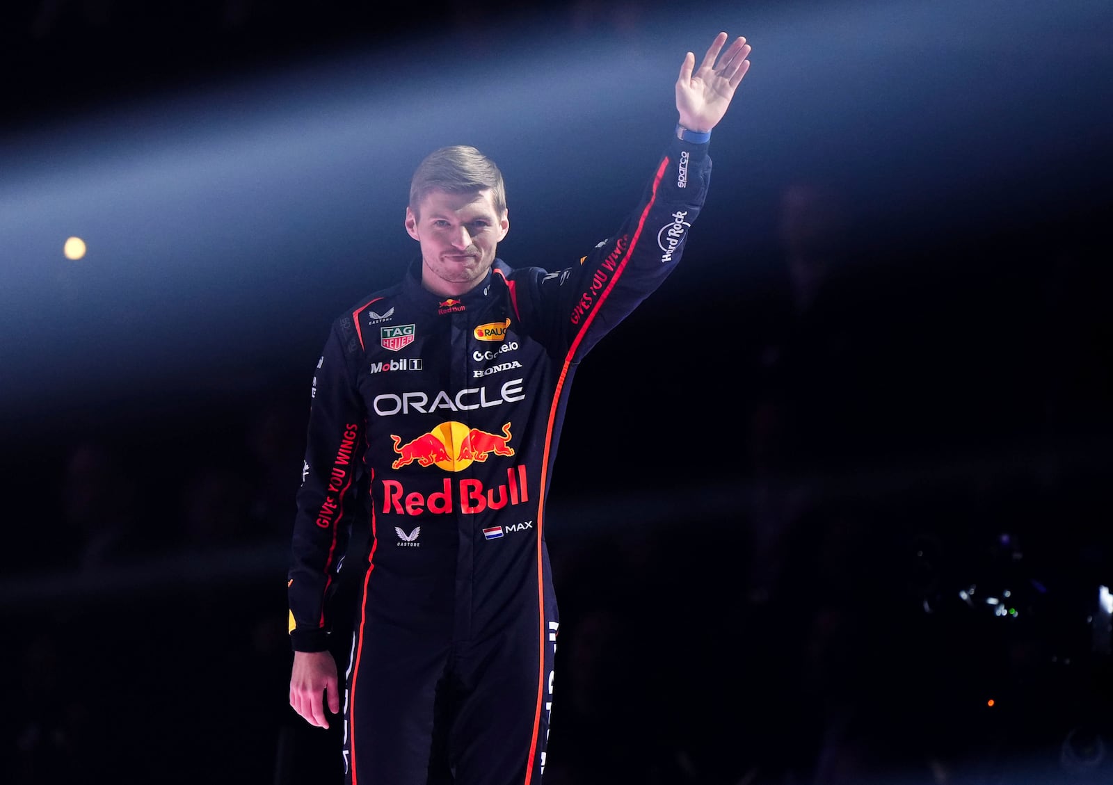 Red Bull driver Max Verstappen waves during the F1 75 Live event at the O2 arena in London, England, Tuesday, Feb. 18, 2025.(Bradley Collyer/PA via AP)