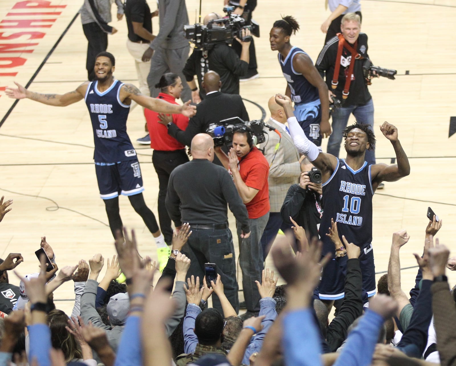 Rhode Island celebrates a victory against Virginia Commonwealth in the quarterfinals of the Atlantic 10 tournament on Friday, March 15, 2019, at the Barclays Center in Brooklyn, N.Y. David Jablonski/Staff