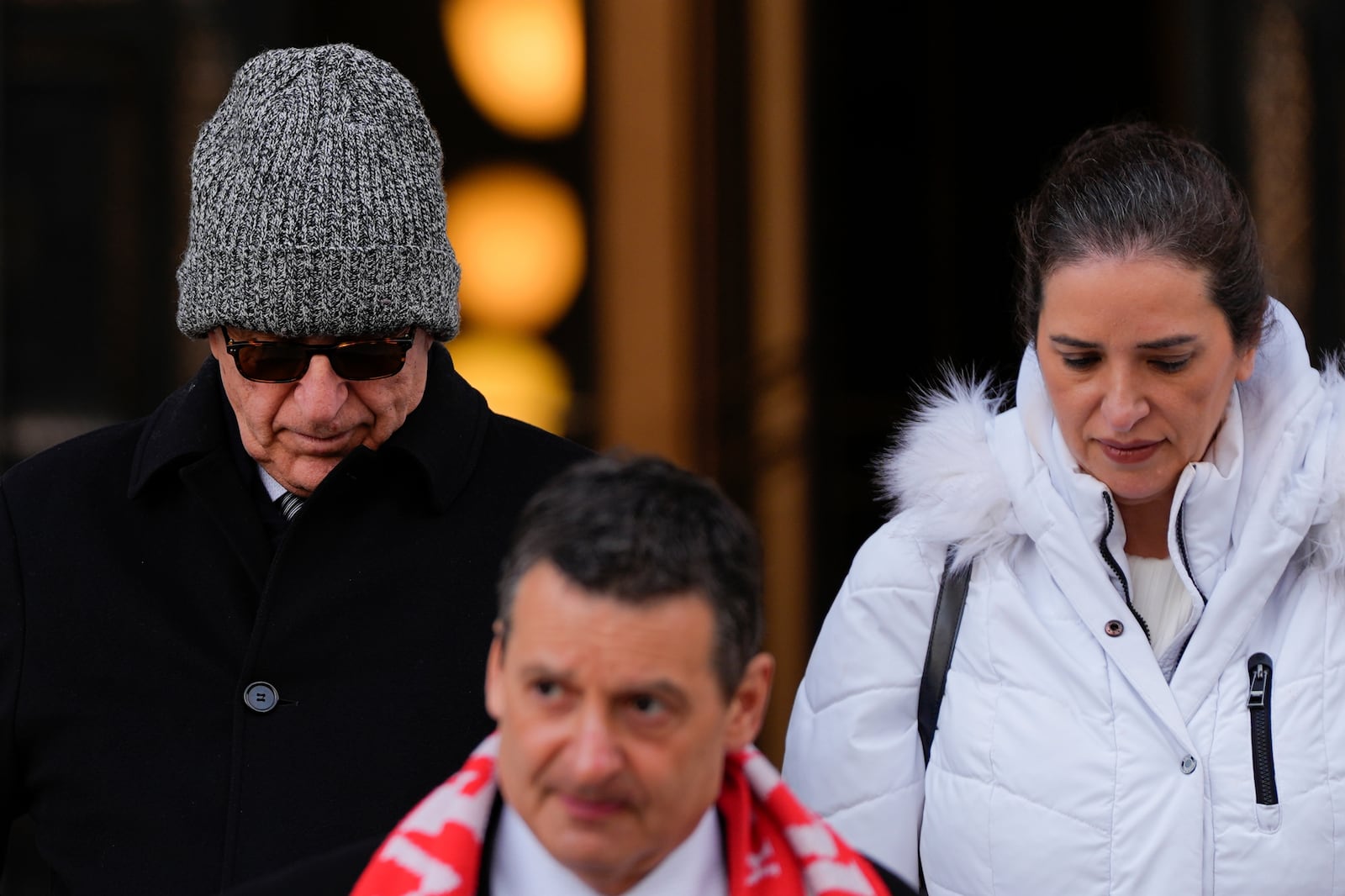 Erden Arkan, left, leaves federal court, Friday, Jan. 10, 2025, in New York after pleading guilty to a charge alleging that he worked with a Turkish government official to funnel illegal campaign contributions to New York City Mayor Eric Adams. (AP Photo/Julia Demaree Nikhinson)