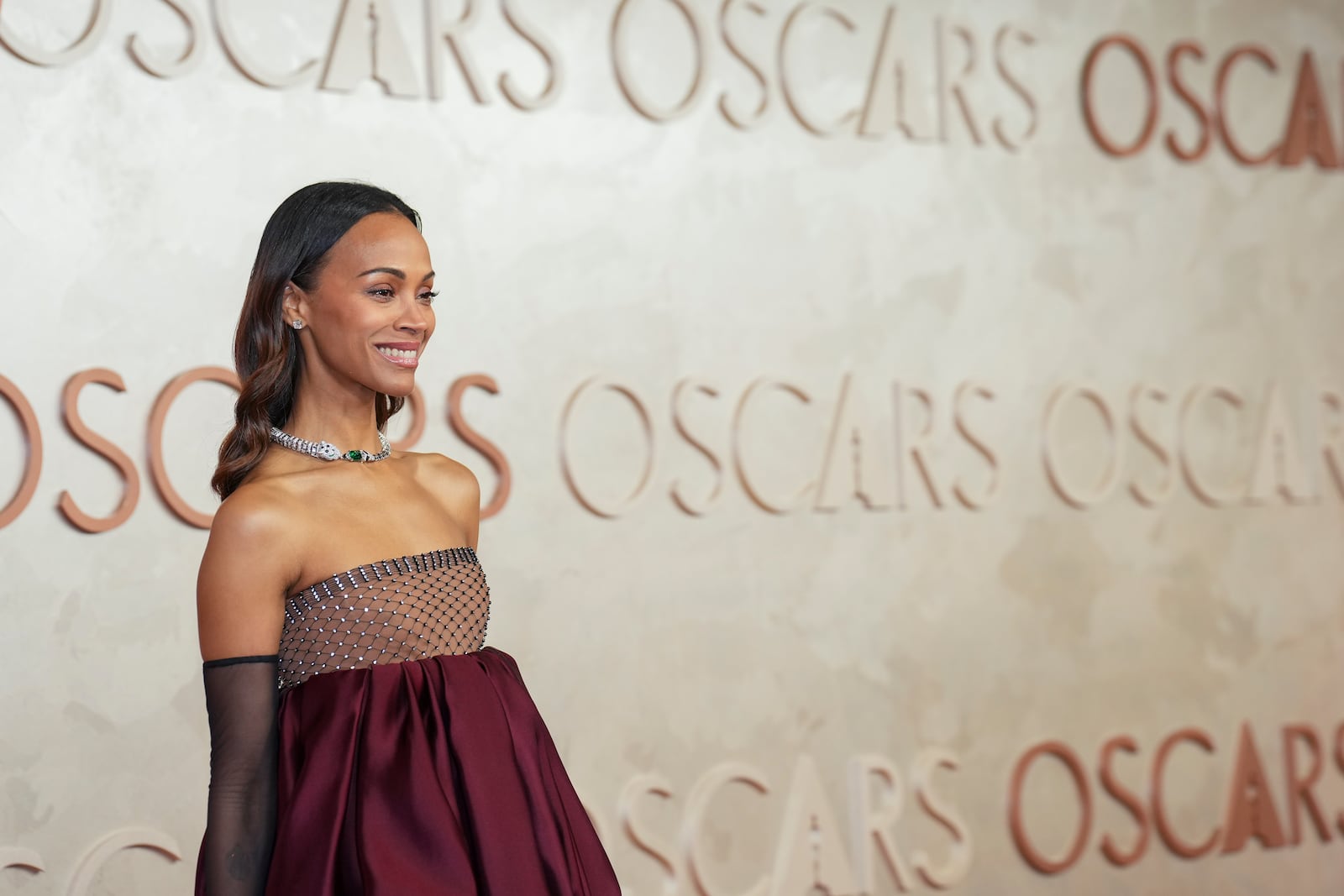 Zoe Saldana arrives at the Oscars on Sunday, March 2, 2025, at the Dolby Theatre in Los Angeles. (AP Photo/Jae C. Hong)