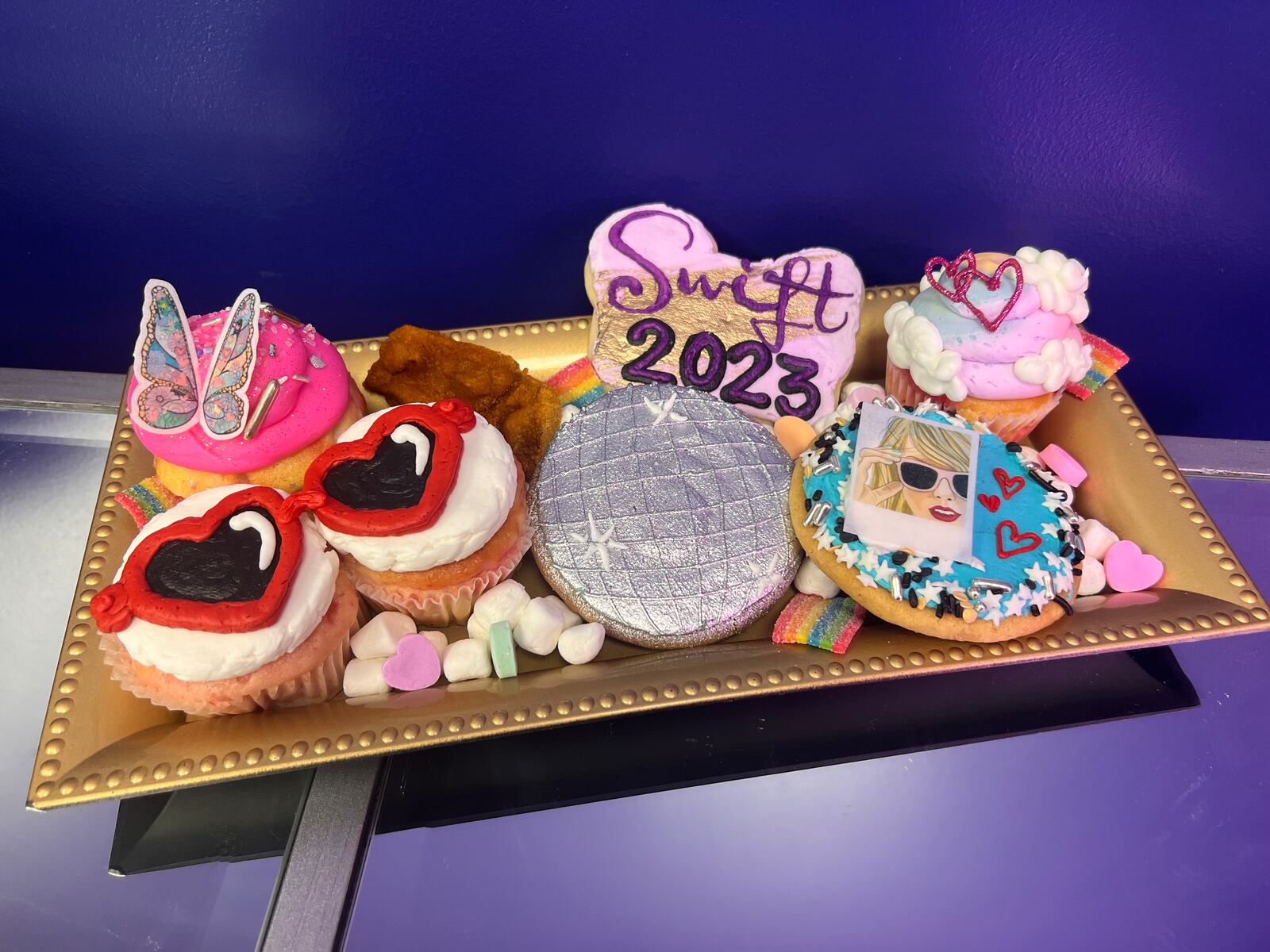 RachelBakes & Co is offering a specialty Taylor Swift treat box that includes four cupcakes, three cookies and a buttercream “chicken tender” modeled after Swift’s favorite food. CONTRIBUTED PHOTO