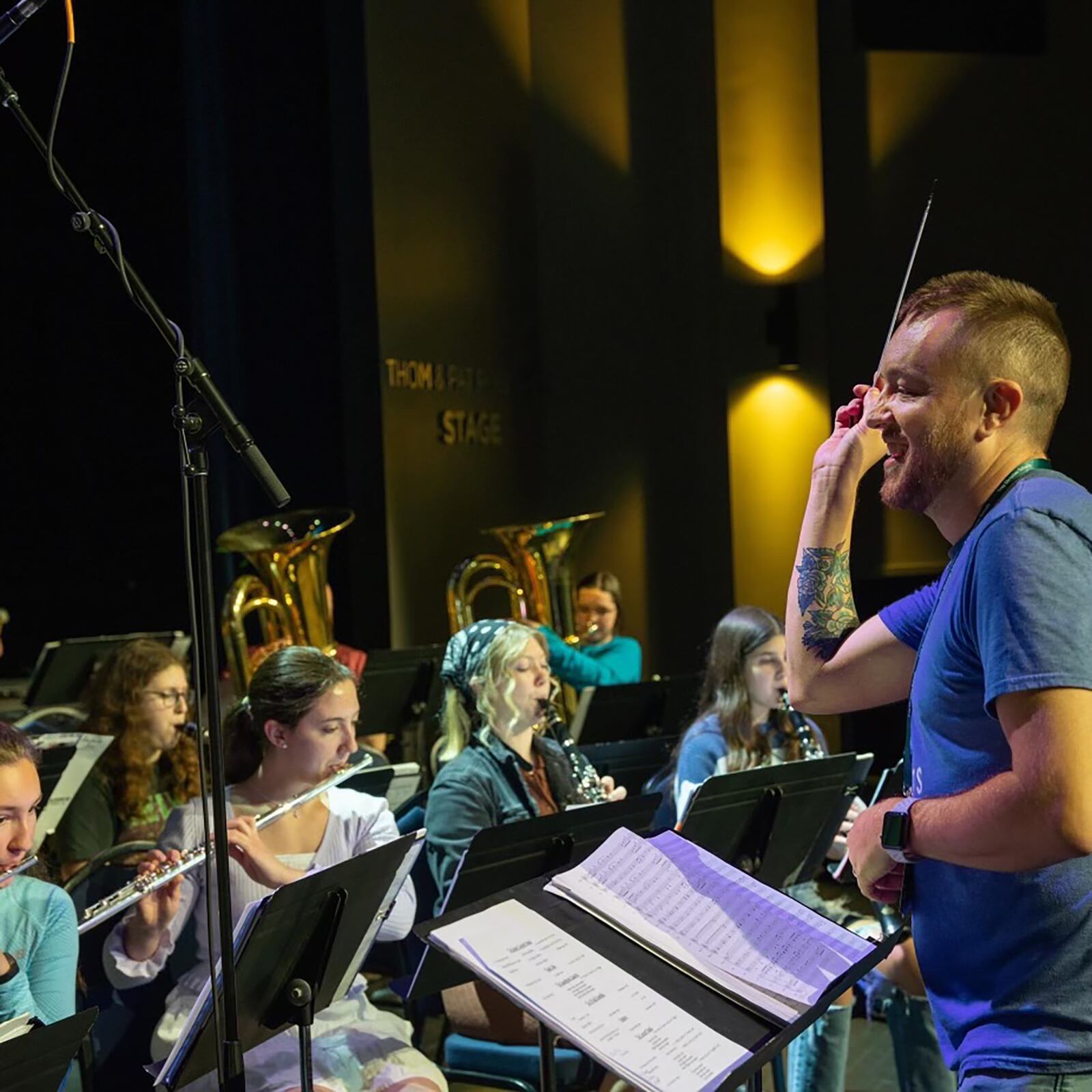 Kennon directing the band at Troy Christian school. He has worked there since 2014.