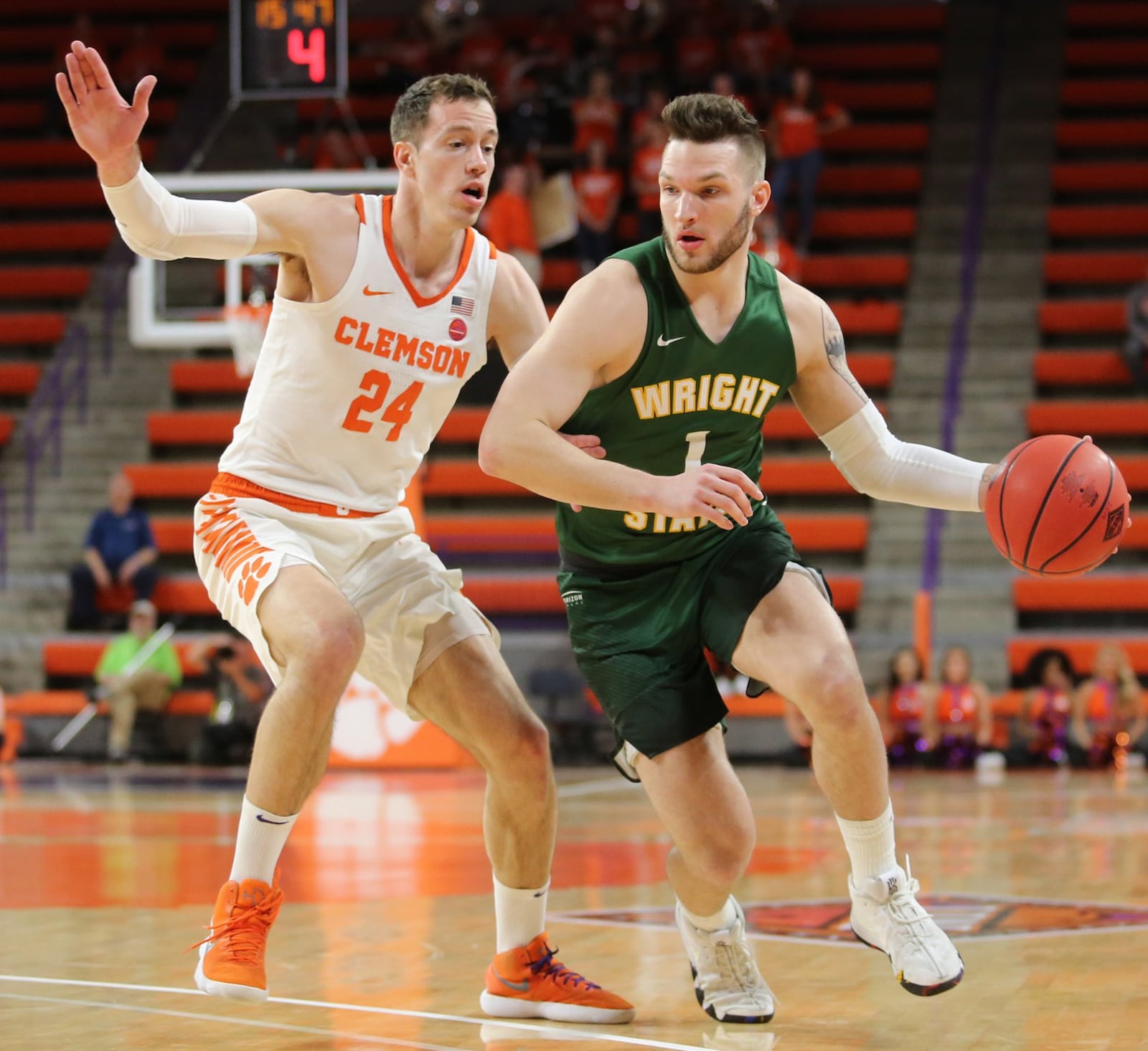 Wright State’s Bill Wampler (1) dribbles against Clemson’s David Skara (24) during Tuesday night’s NIT game at Littlejohn Coliseum in Clemson, S.C. Clemson won 75-69. PHOTO COURTESY OF CLEMSON ATHLETICS