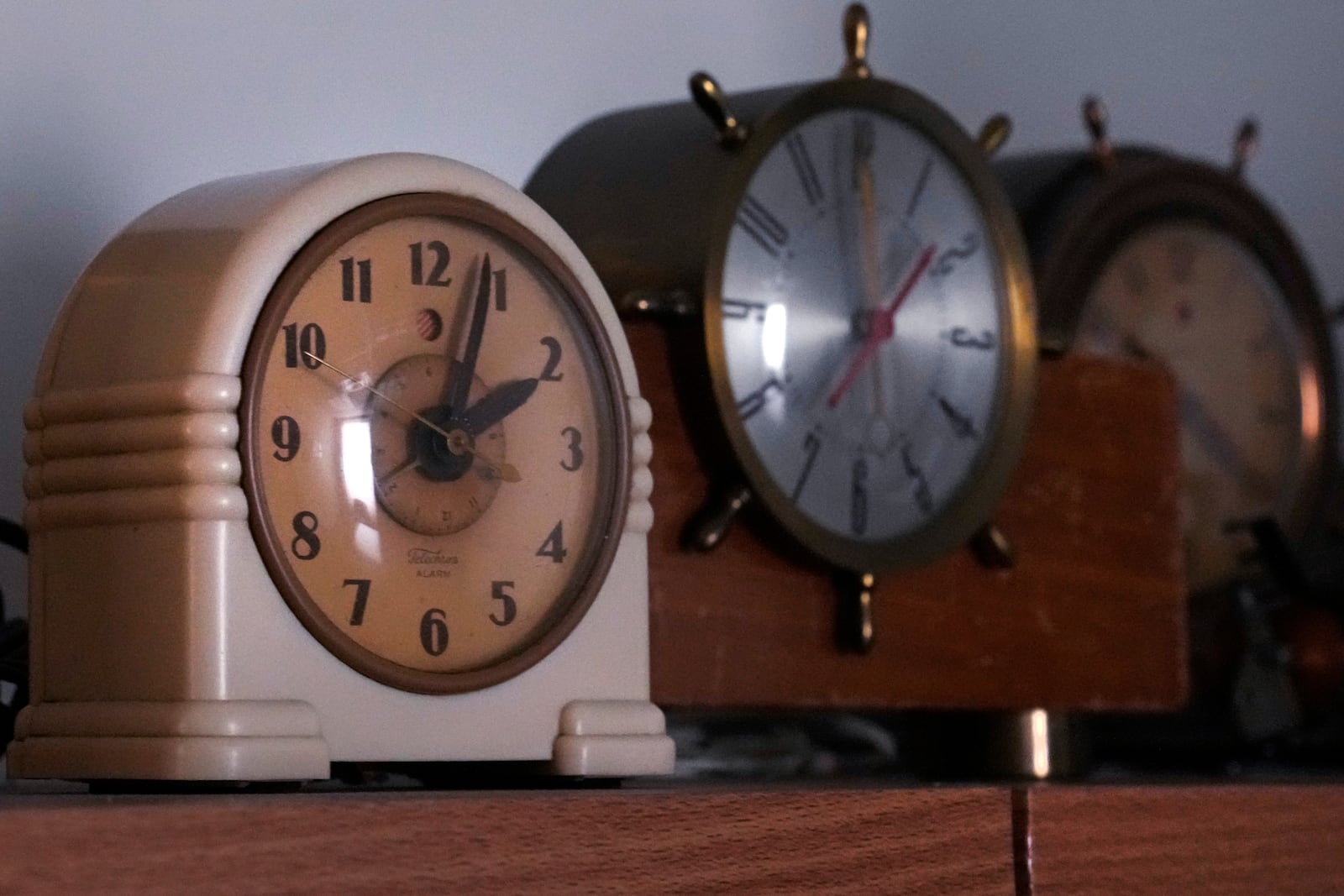 Vintage clocks are displayed at the Electric Time Company, Wednesday, Oct. 30, 2024, in Medfield, Mass. (AP Photo/Charles Krupa)