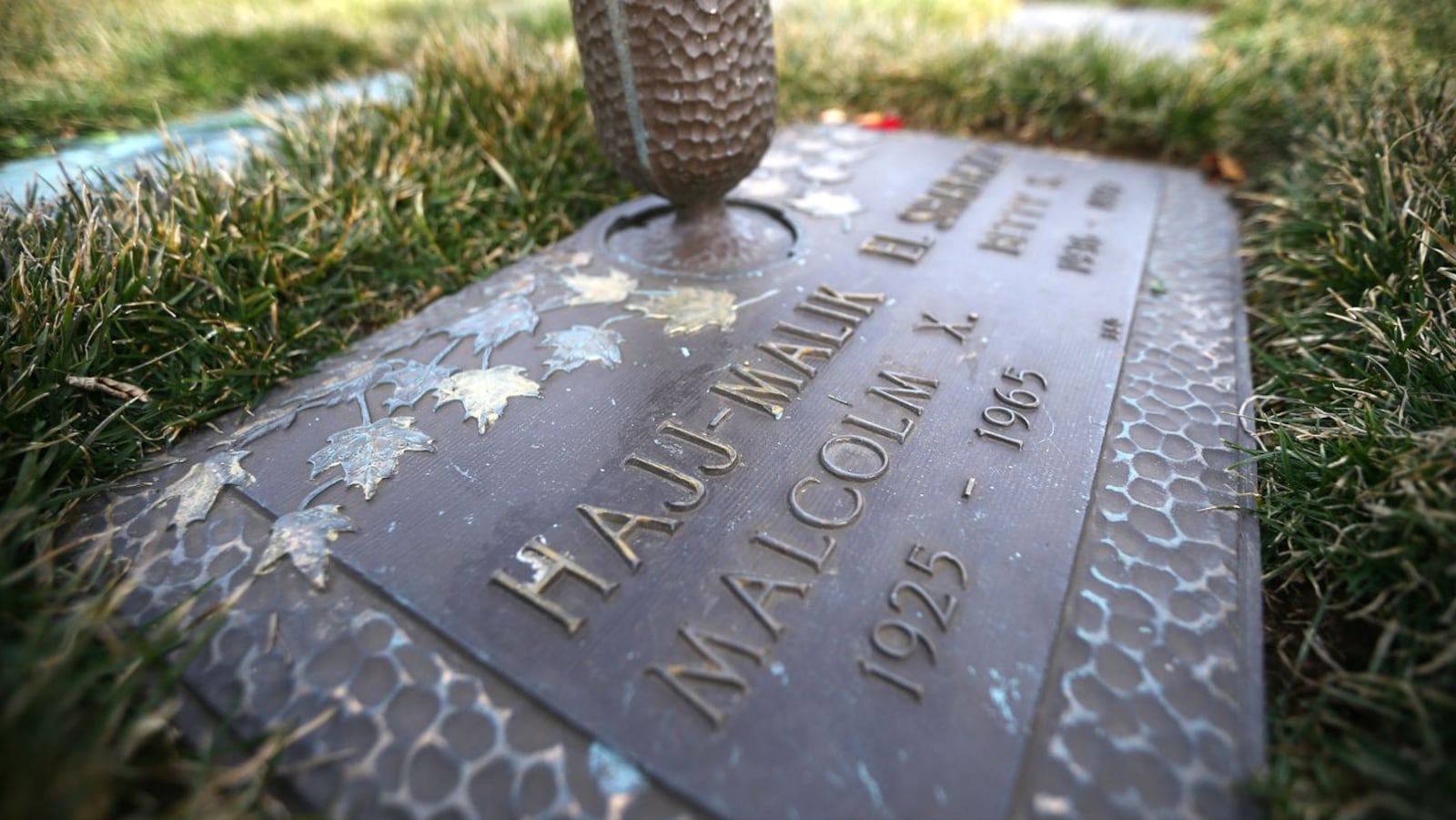 The grave of slain civil rights leader Malcolm X is seen at Ferncliff Cemetery in Greenburgh, N.Y. A recently released Netflix documentary on the killing has prompted the Manhattan district attorney to open a review of the case. The documentary theorizes that two of the three men convicted in the case were innocent.