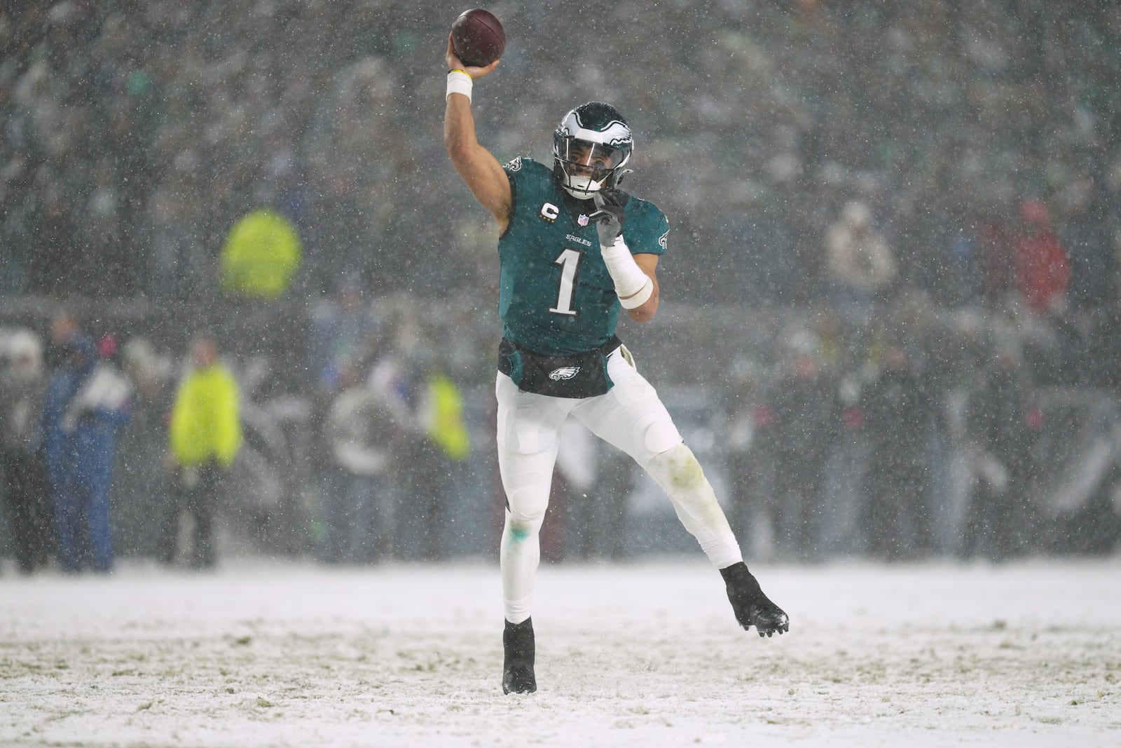 Philadelphia Eagles quarterback Jalen Hurts (1) passes during the second half of an NFL football NFC divisional playoff game against the Los Angeles Rams on Sunday, Jan. 19, 2025, in Philadelphia. (AP Photo/Derik Hamilton)