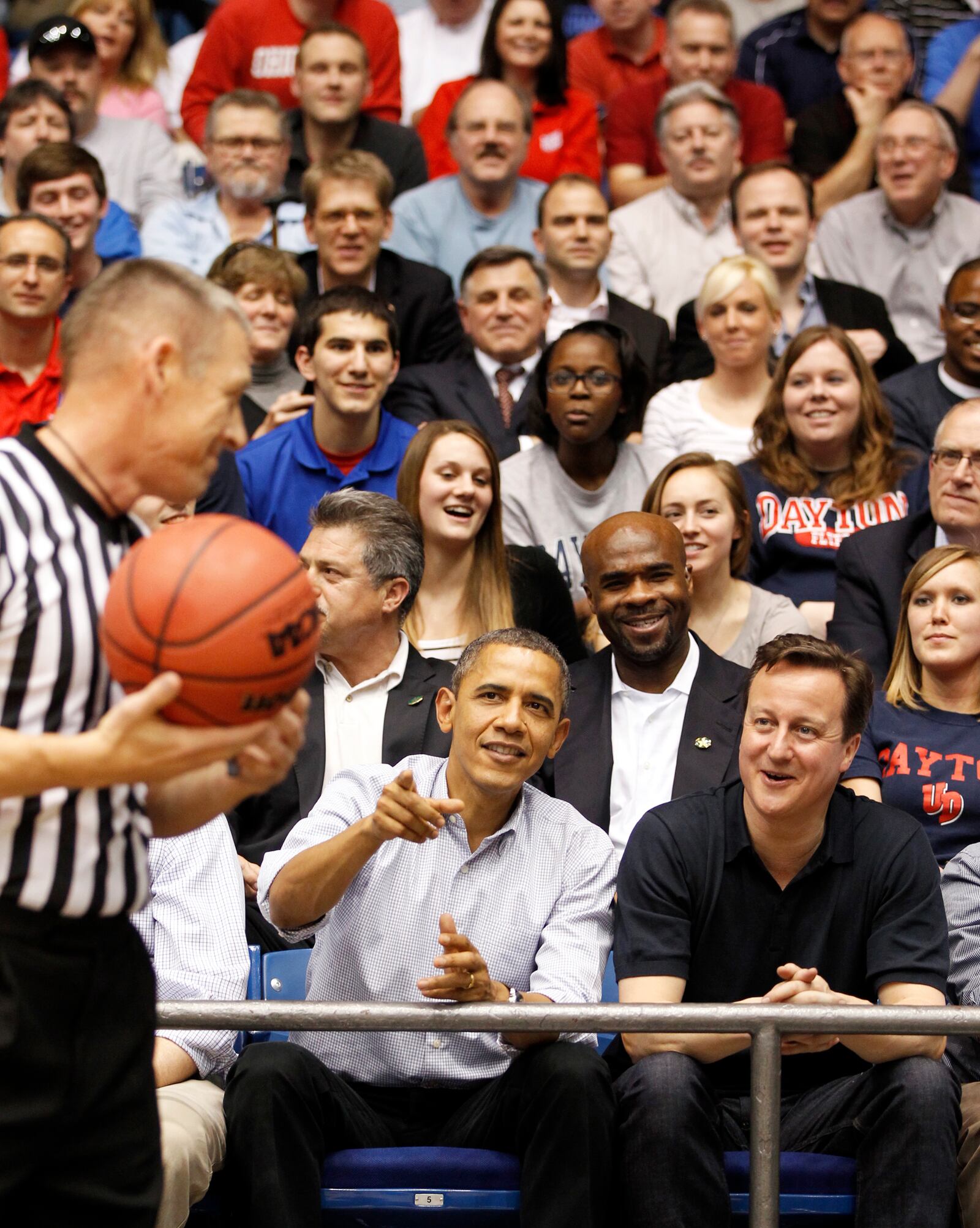 President Barack Obama and British Prime Minister David Cameron attend the First Four opening round game between Mississippi Valley State and Western Kentucky at University of Dayton Arena, Tuesday, March 13, 2012, in Dayton, Ohio. Staff Photo by Ty Greenlees