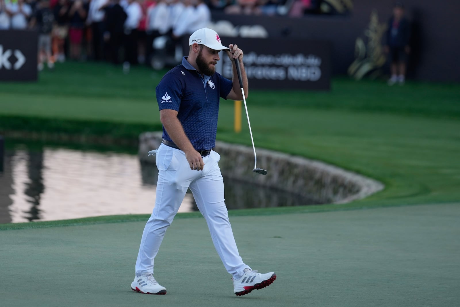 Tyrell Hatton of England walks after winning the Dubai Desert Classic golf tournament, in Dubai, United Arab Emirates, Sunday, Jan. 19, 2025. (AP Photo/Altaf Qadri)