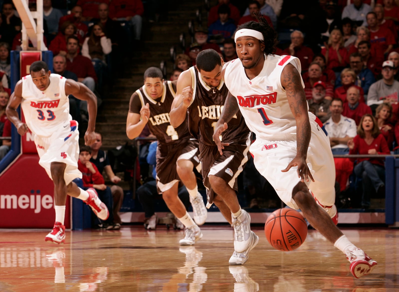 Dayton's London Warren leads the offense down the court against Lehigh on Dec. 6, 2009, at UD Arena. Photo by Erik Schelkun