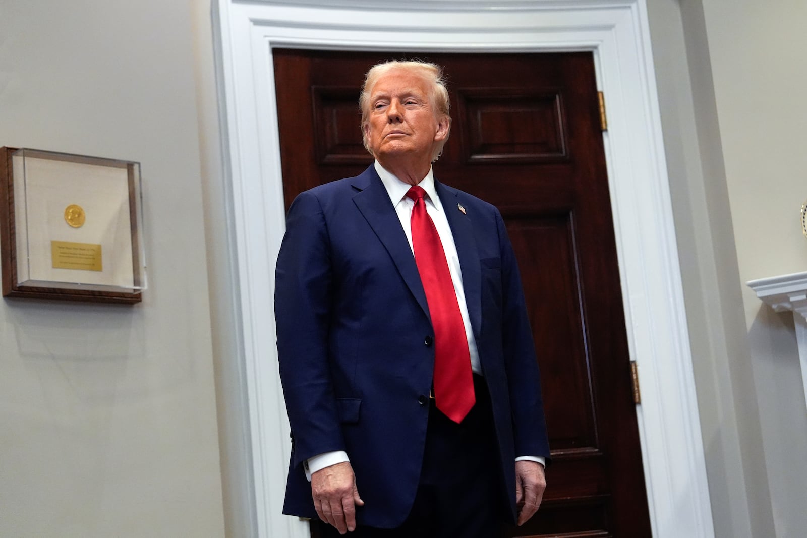 President Donald Trump listens in the Roosevelt Room at the White House, Tuesday, Jan. 21, 2025, in Washington. (AP Photo/Julia Demaree Nikhinson)