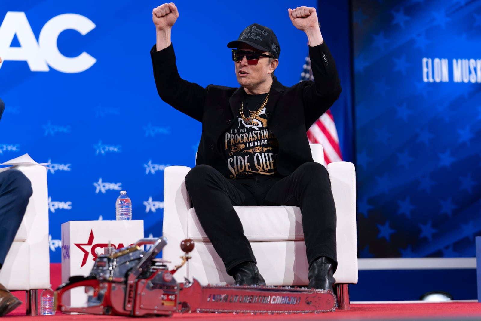 Elon Musk gestures during the Conservative Political Action Conference, CPAC, at the Gaylord National Resort & Convention Center, Thursday, Feb. 20, 2025, in Oxon Hill, Md. (AP Photo/Jose Luis Magana)