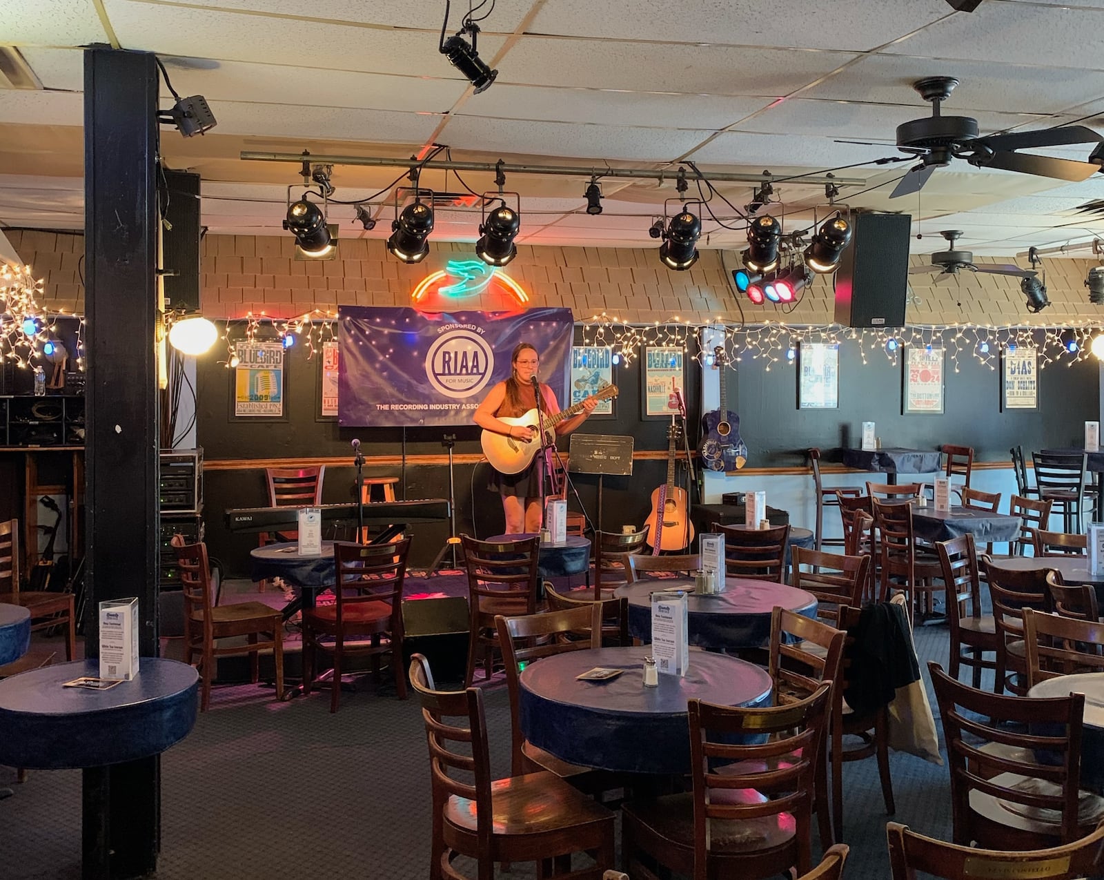 Georgia Evans, aka Midwestern Mrs, pre-show soundcheck at the Bluebird Cafe, 2024. CONTRIBUTED