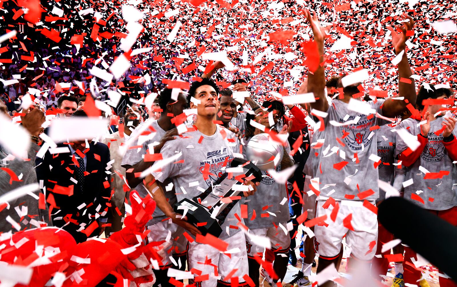 St. John's guard RJ Luis Jr. celebrates with teammates after winning the Big East Conference regular season title after they defeated Seton Hall in an NCAA college basketball game, Saturday, March 1, 2025, in New York. (AP Photo/Noah K. Murray)